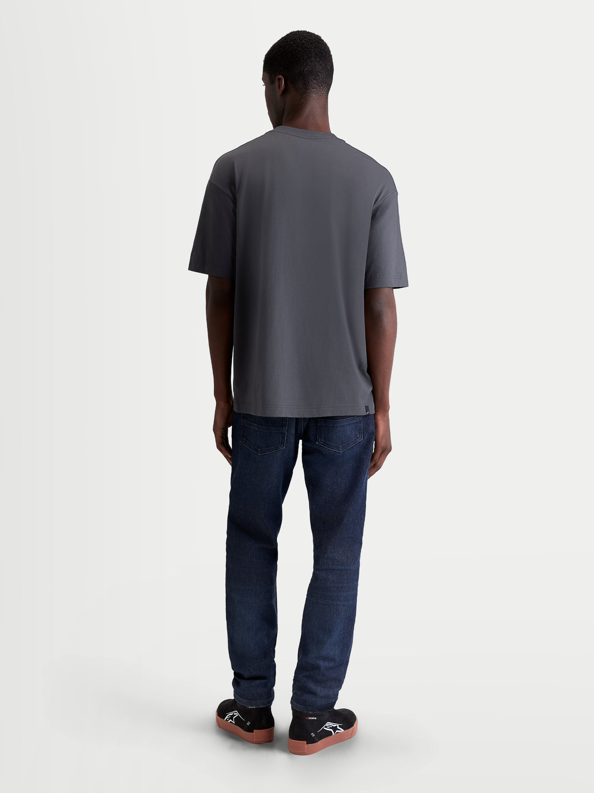 Alpinestars Chalk Oversized CSF Tee, Men's Relaxed Fit Sportswear T-shirt in Charcoal Gray, shown from the back on a model, everyday motorsport lifestyle apparel.