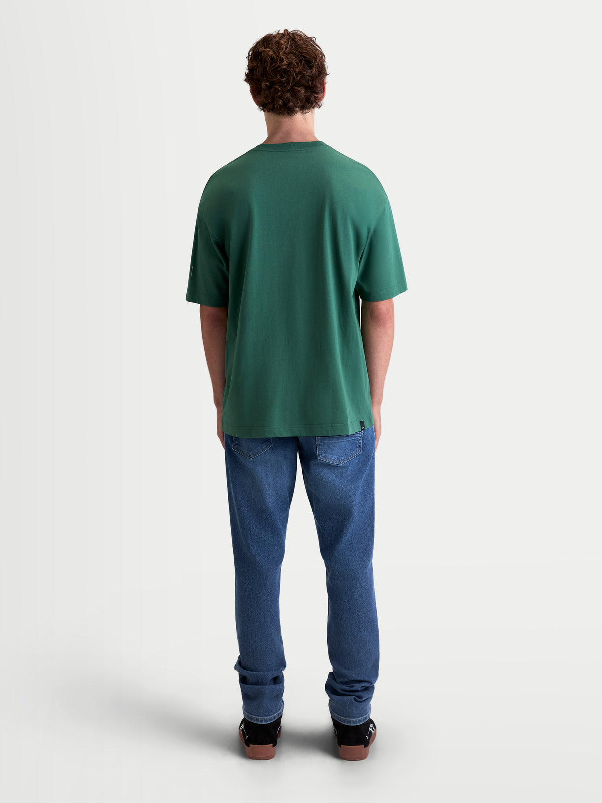 Alpinestars Infinity Oversized CSF Tee, Men's Short Sleeve Sportswear T-Shirt, Green, Relaxed Fit Cotton-Poly Blend, Back View on Model for Casual Everyday Style