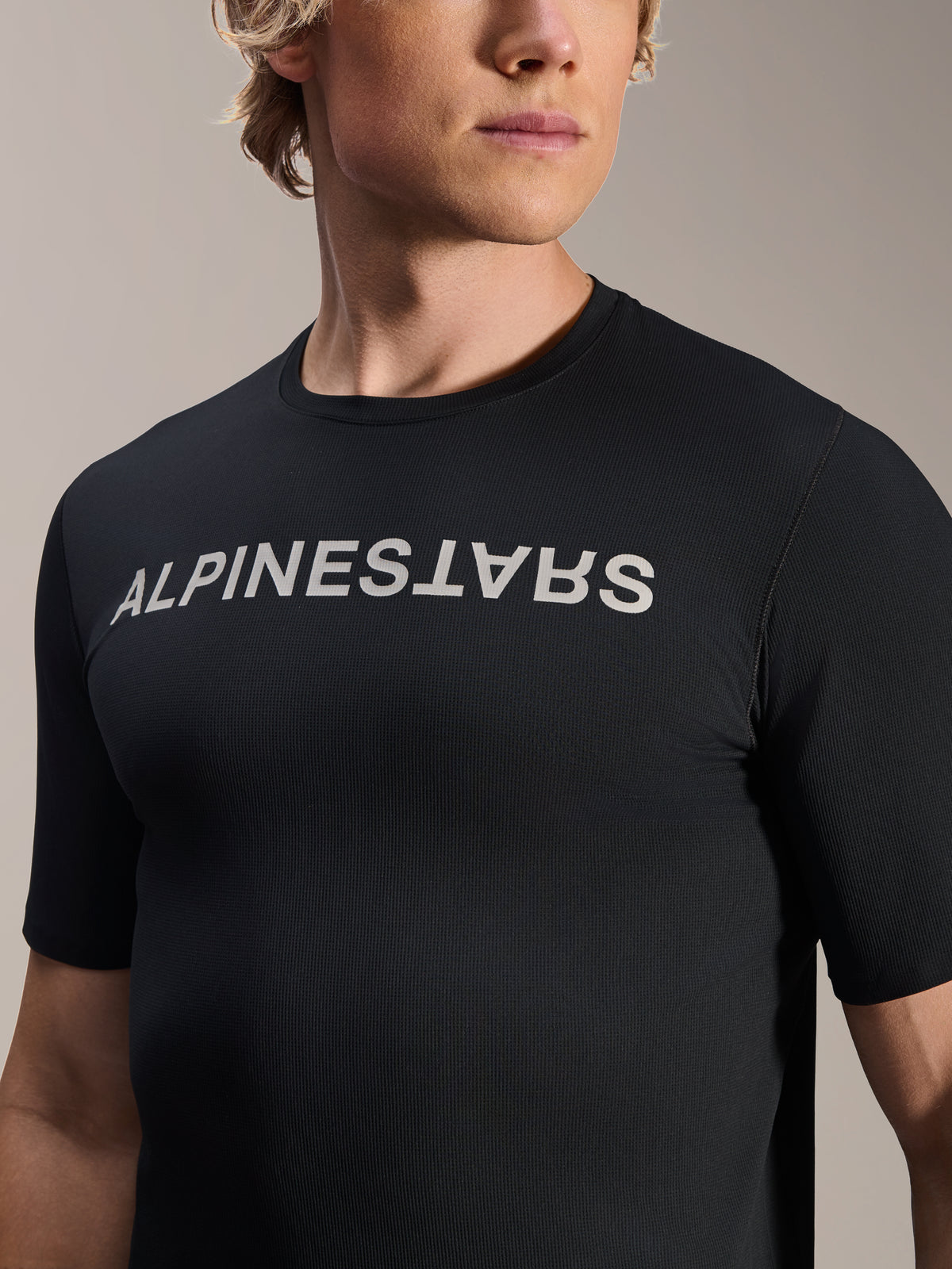 Alpinestars A-Aria Switch Jersey - Short Sleeve, Black, featuring white Alpinestars logo across the chest, performance fit, breathable men's cycling apparel