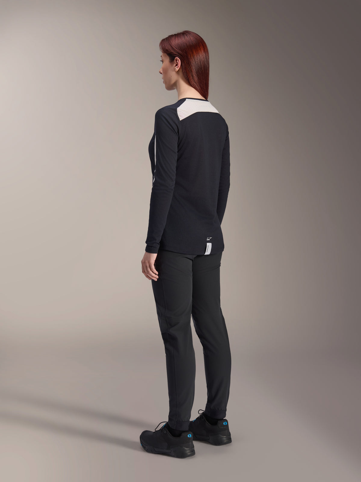 Alpinestars Women Stella A-Dura Dri Astar Long Sleeve Jersey, Black, back view showing white mesh panel on the upper back and shoulders, performance mountain bike cycling gear