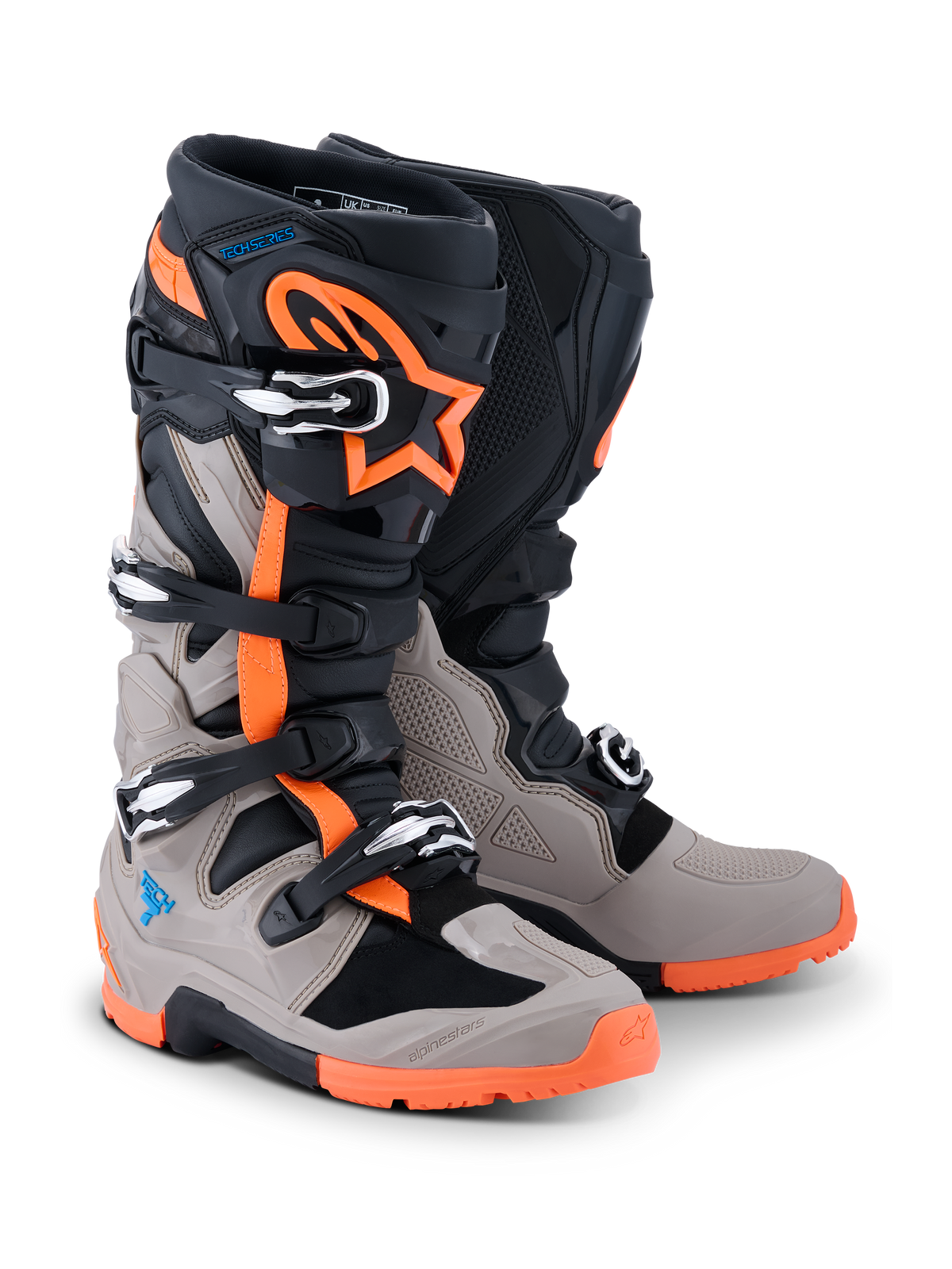 Alpinestars 2026 Tech 7 Enduro Boots, Black Warm Gray and Orange Fluo, off-road motorcycle boots with four buckle closures, rugged orange sole, protective TPU panels, and Alpinestars branding