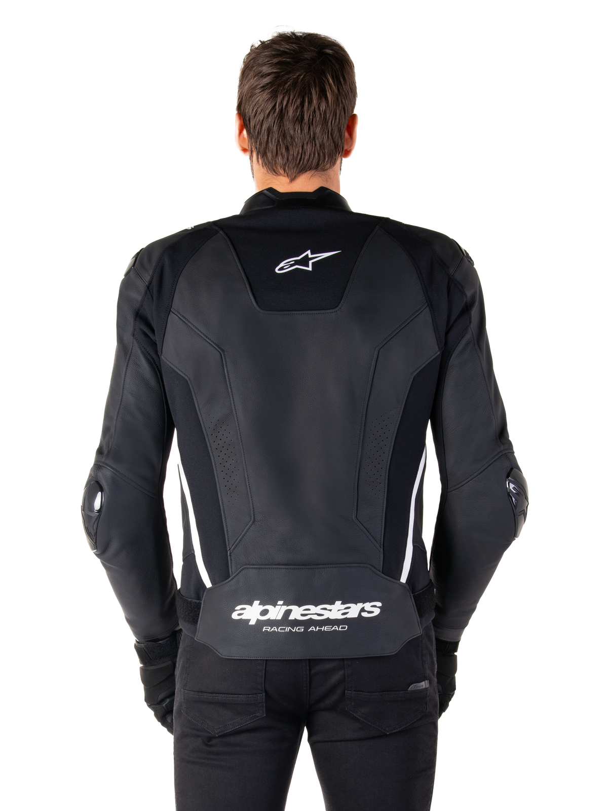 Rear view of the Alpinestars Missile V3 Leather Jacket in Black and White, featuring the Alpinestars star logo on the upper back and branding on the lower lumbar, white vertical stripes, and external elbow sliders, premium leather racing sport jacket.