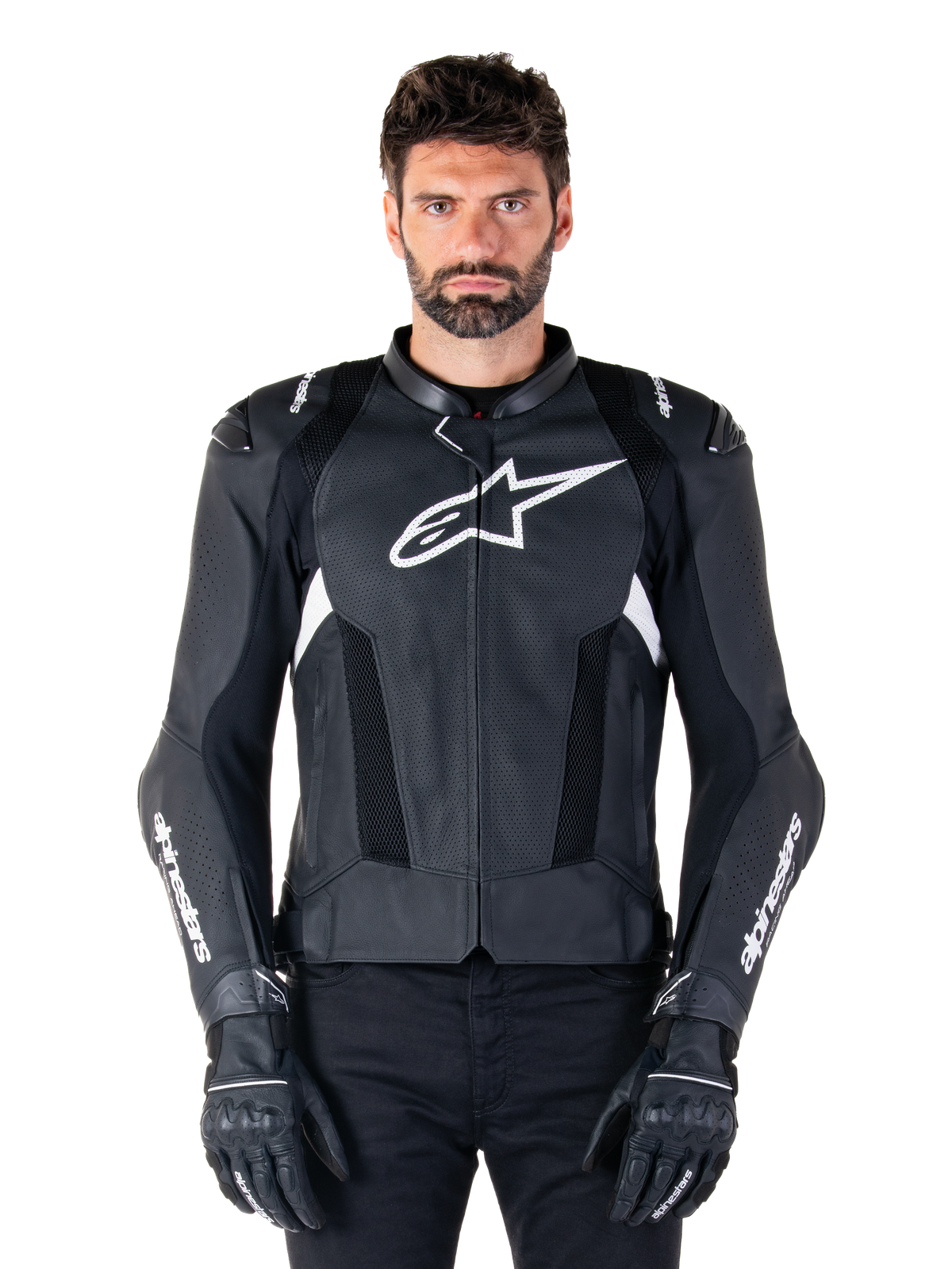 Alpinestars Missile V3 Airflow Leather Jacket, Black and White, motorcycle racing jacket with perforated leather ventilation panels, large white star logo on chest, worn with matching gloves, sporty protective design