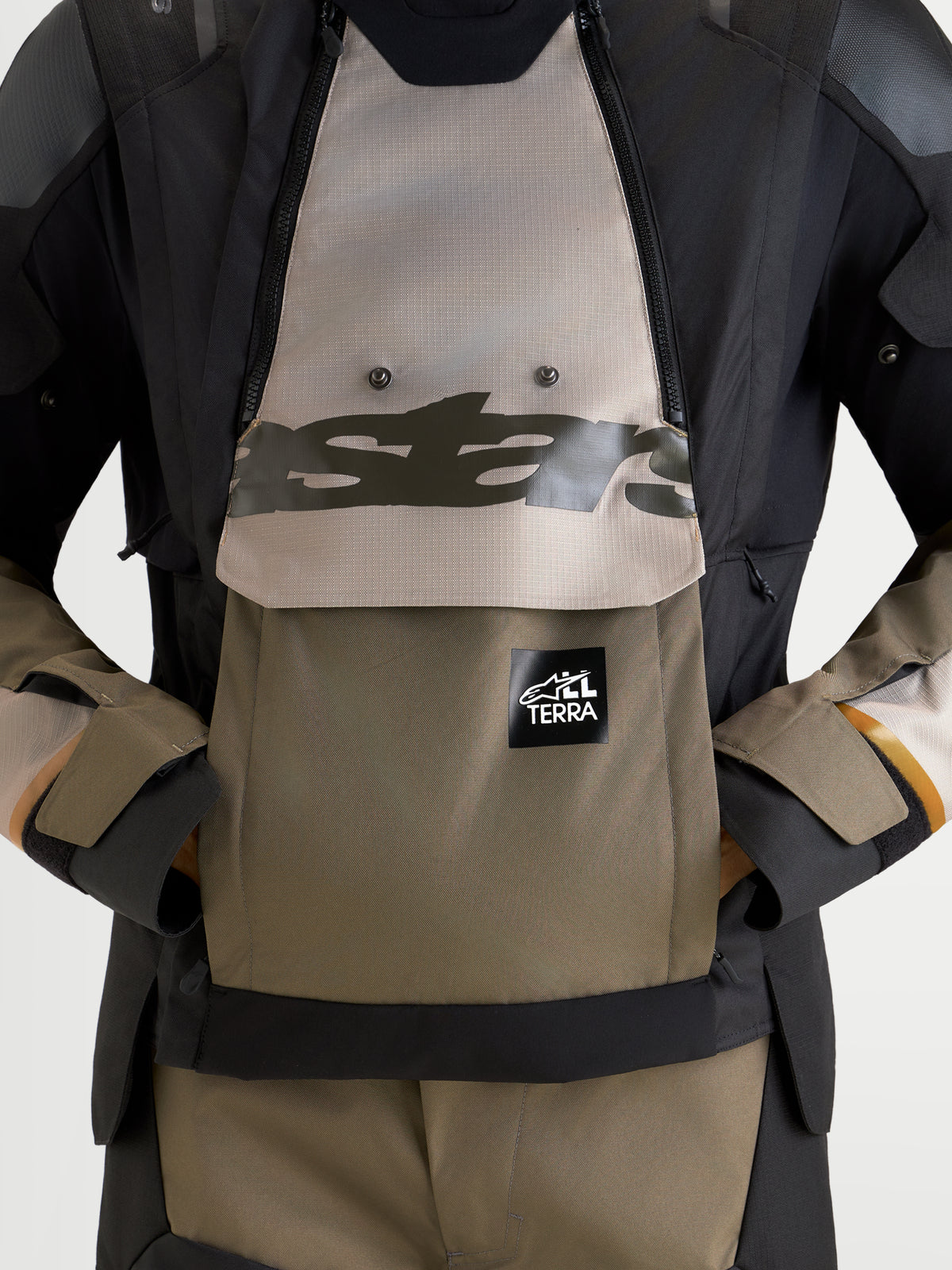 Alpinestars Harok V2 Drystar Jacket, Men's Adventure Motorcycle Jacket, Aluminum, Walnut, and Black, featuring a large waterproof kangaroo pocket and chest details