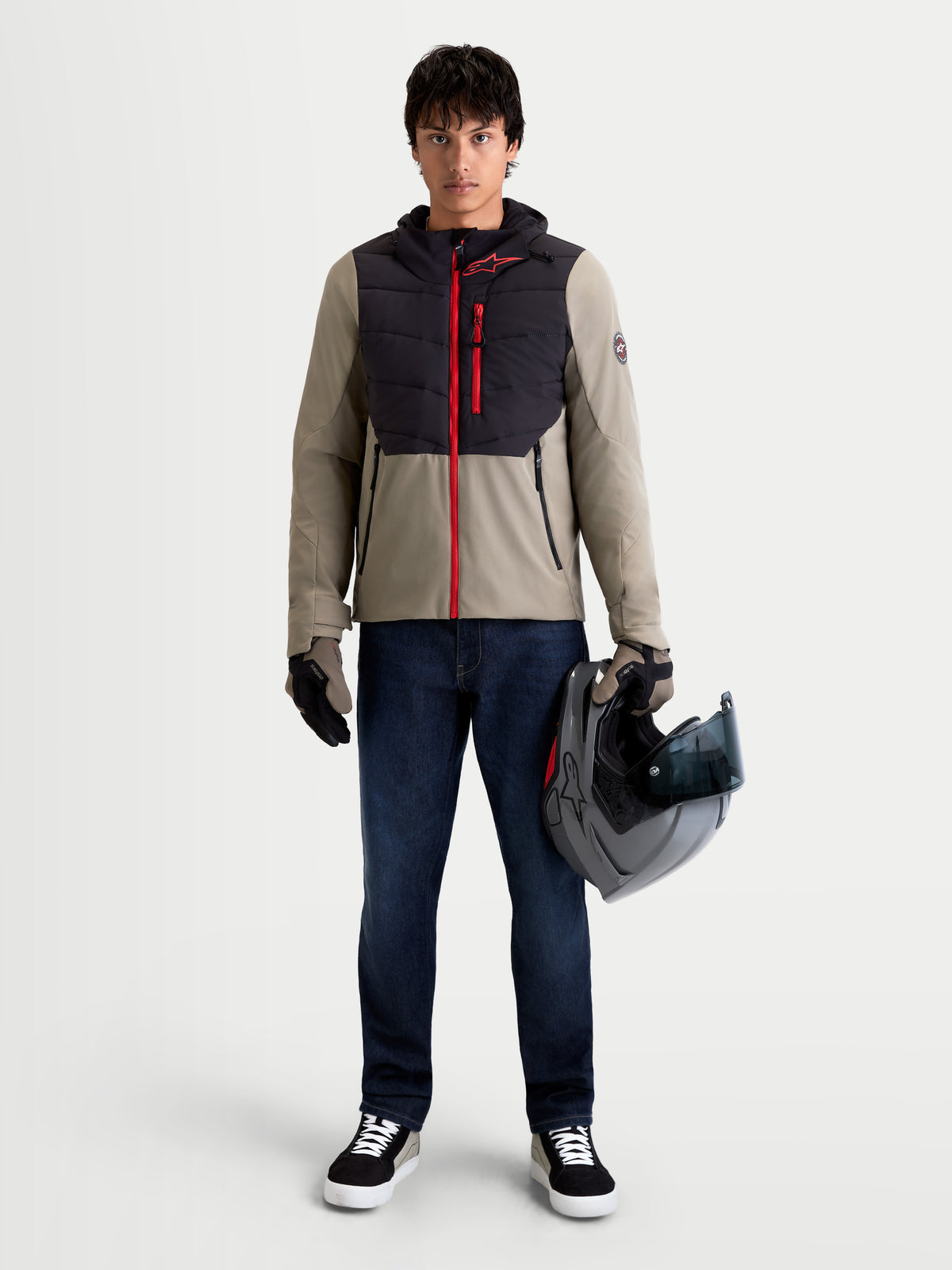 Alpinestars Therma-Tech Waterproof Jacket, men's urban contemporary motorcycle textile jacket in black and vetiver, front full-length view on a model wearing matching gloves and holding a helmet, waterproof and insulated road-riding apparel.