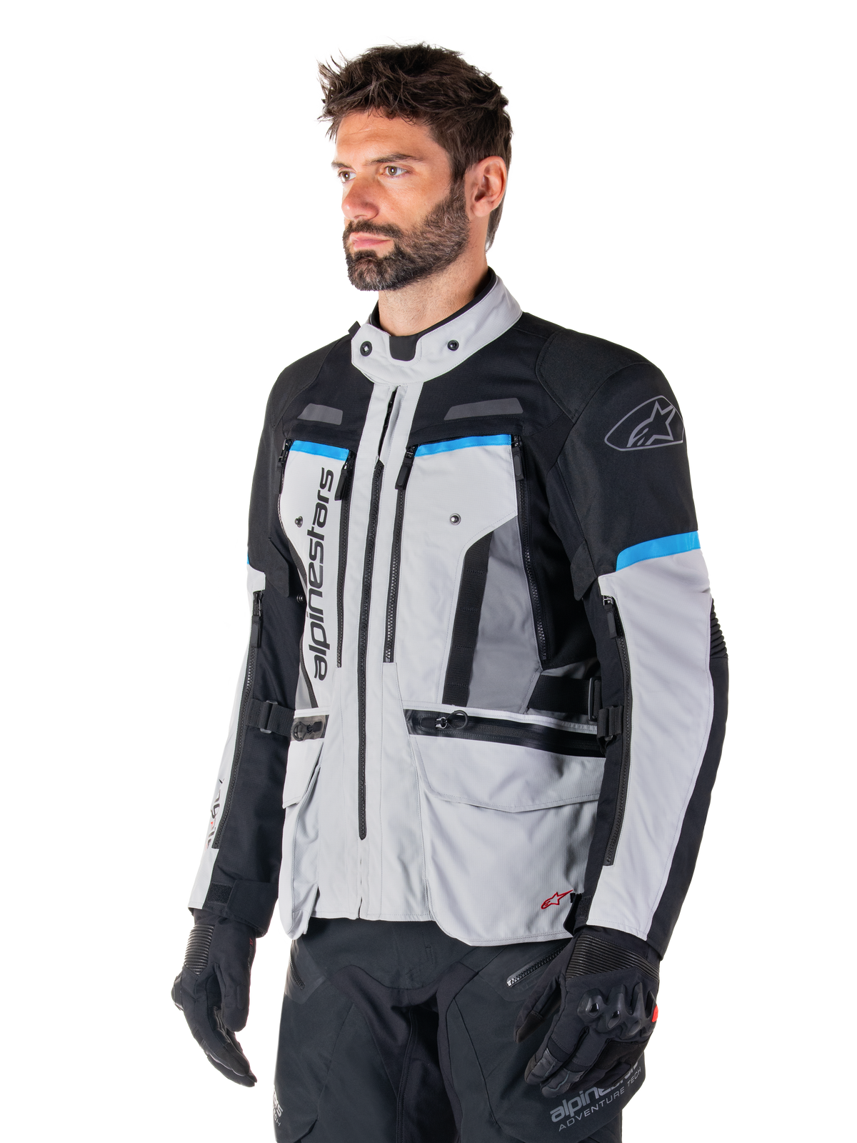 Alpinestars Bogota' Pro Drystar® Jacket, men's textile adventure motorcycle jacket in Ice Gray, Black, and Cyan.