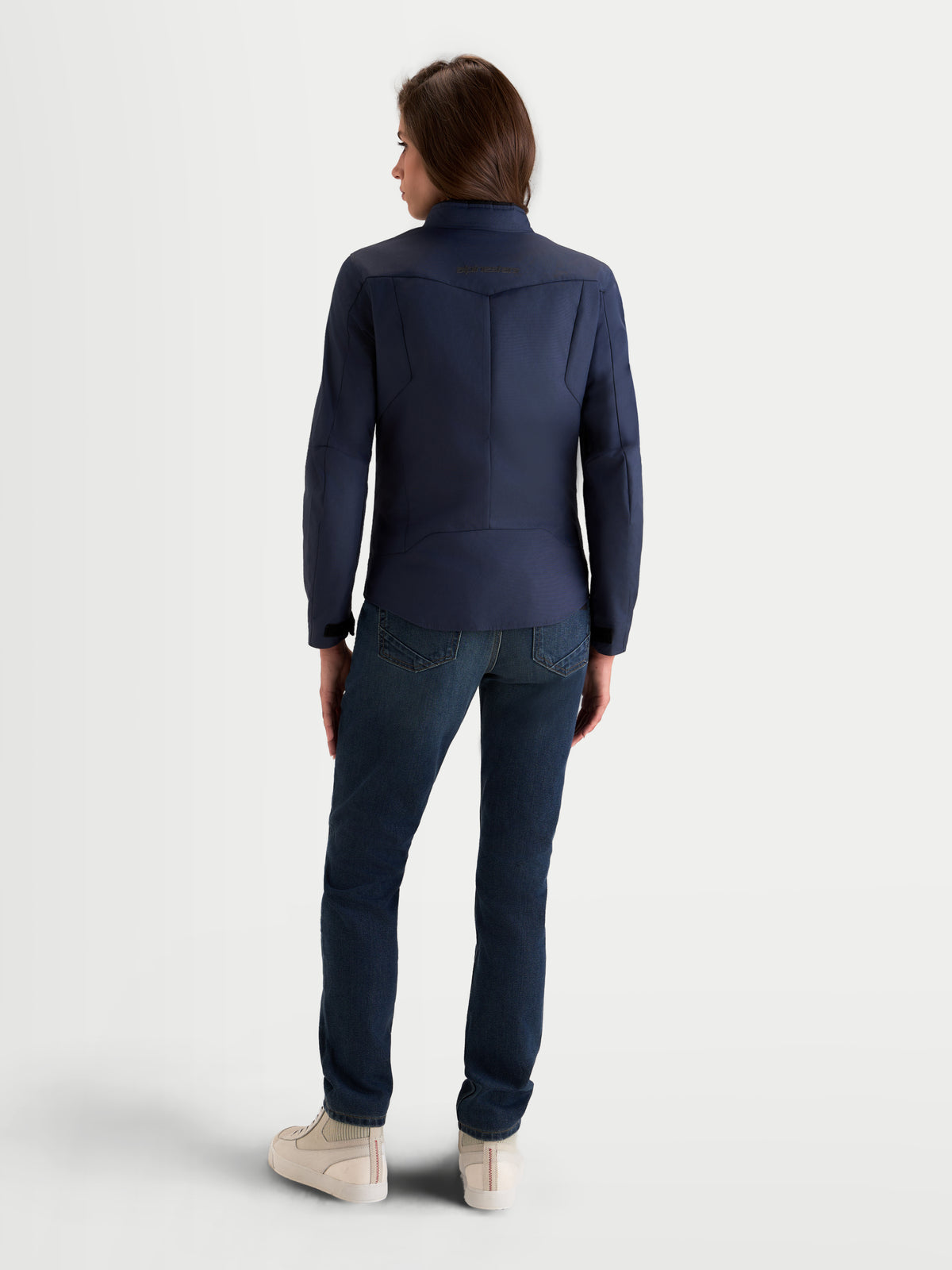 Alpinestars Stella C-1 Waterproof Jacket, women's urban motorcycle textile jacket in mood indigo, rear view showing 3D back construction and waterproof riding apparel worn by a model.