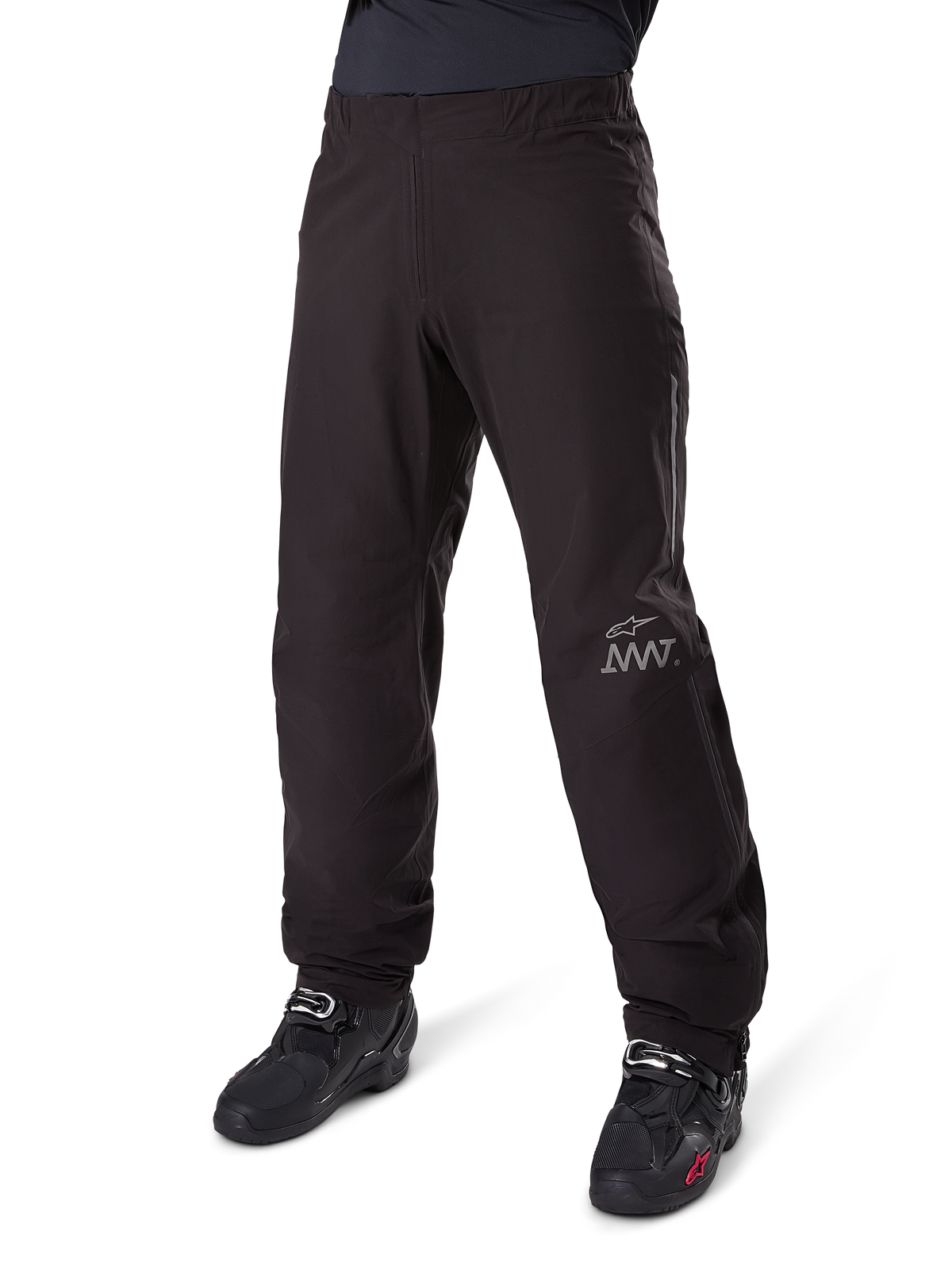Alpinestars Amt-8 Stretch Drystar® XF Pant Liner, Black, waterproof and stretchable textile construction with silver AMT logo, worn with black riding boots, adventure touring motorcycle gear component.