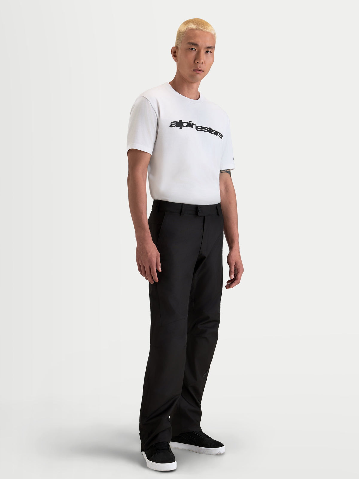 Alpinestars C-1 Waterproof Pants, men's waterproof motorcycle pants in black, straight-fit winter touring apparel worn by a model.