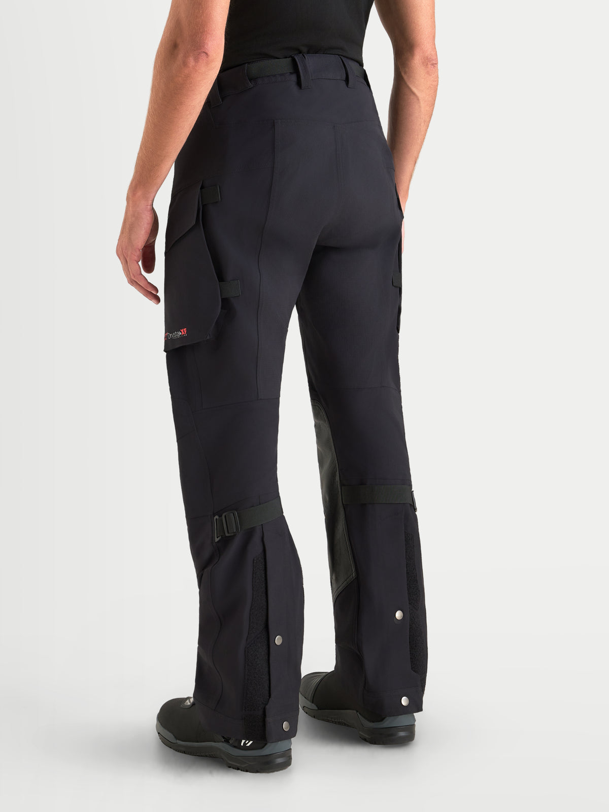 Alpinestars Maxdura Drystar XF Laminated Pants, Men's Adventure Motorcycle Pants in Black Dark Gray, rear view showcasing cargo pockets, over-the-boot fit, and waterproof textile construction