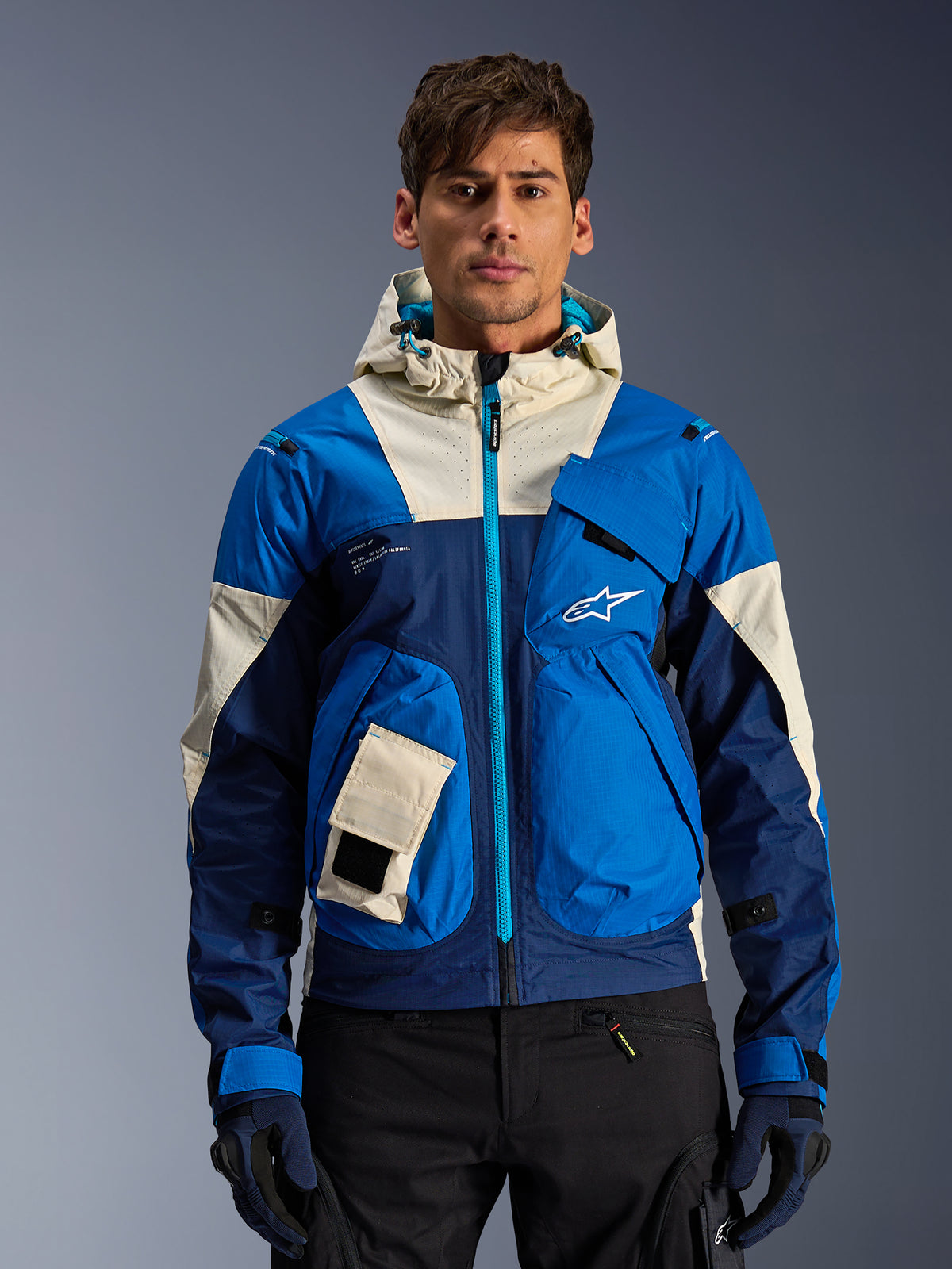 Alpinestars Mogress Air Jacket, men's urban motorcycle jacket in blue and almond with a ventilated hood.