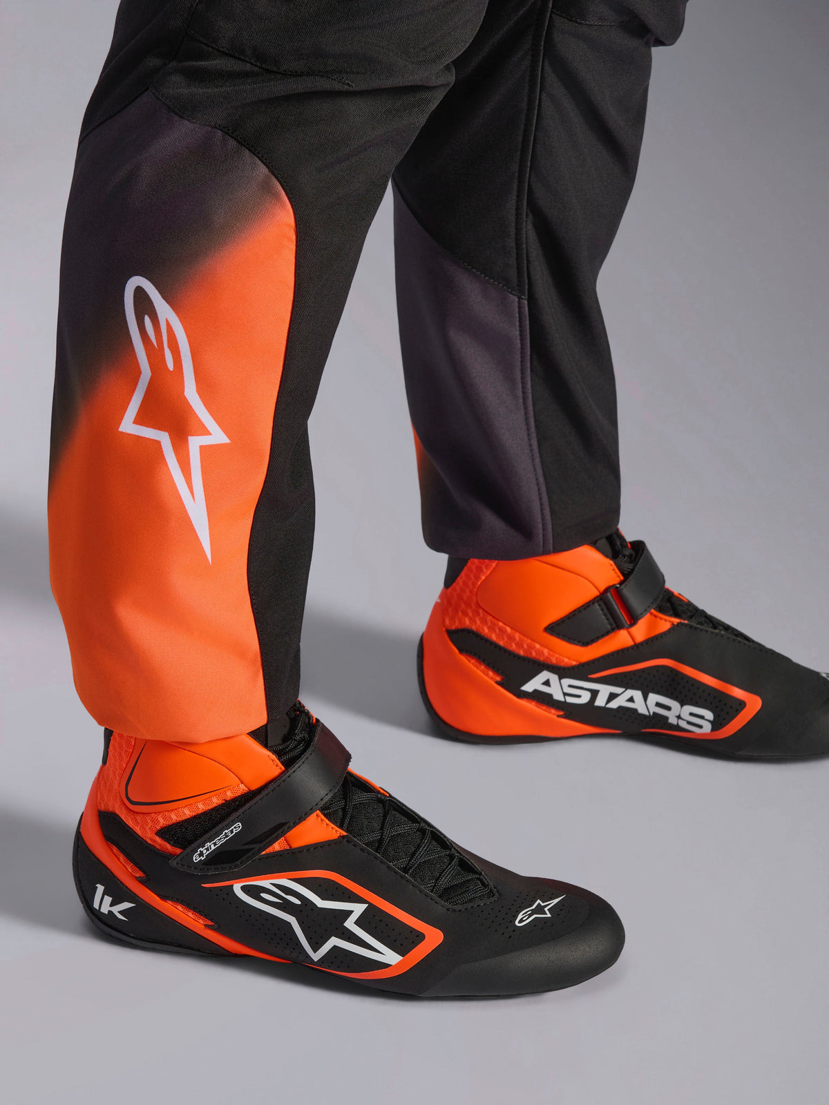 Alpinestars KMX-5 V3 Suit, men's Black and Orange Fluo karting suit with karting shoes, FIA 8877-2022 Grade 1 certified.
