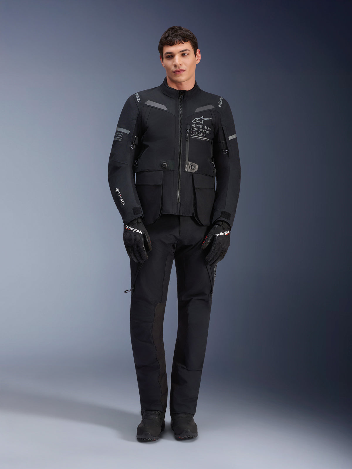 Alpinestars ST-7 2L GORE-TEX Pants, Black Motorcycle Touring Pants, Waterproof and Breathable, Full-body view worn with matching jacket, Premium technical construction for adventure riding
