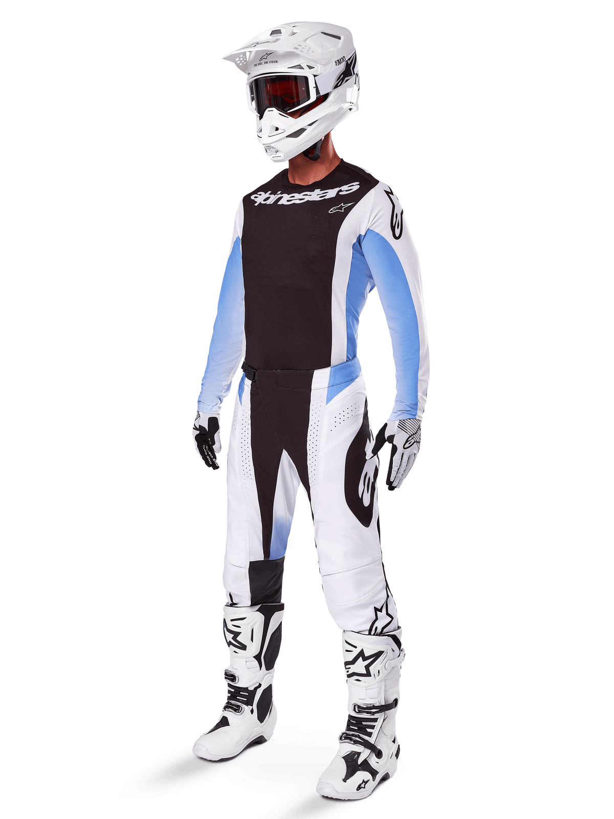 Motocross rider wearing Alpinestars 2025 Techstar Melt Pants, white and black motocross gear with light blue accents, coordinated jersey and gloves, white helmet and goggles, white and black racing boots, professional off-road kit.