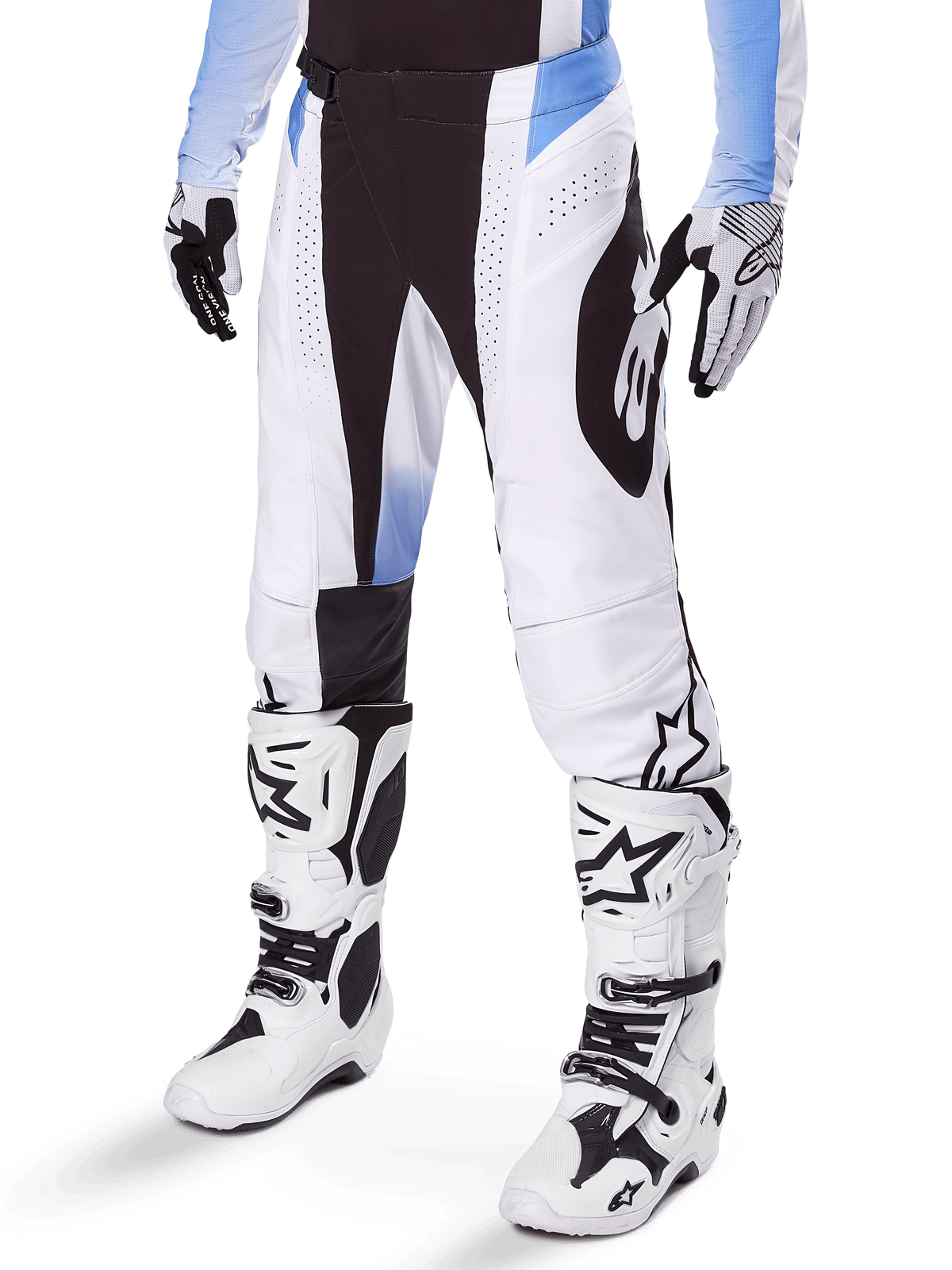 Alpinestars 2025 Techstar Melt Pants, Motocross Pants, White and Black with Blue accents, featuring laser-cut perforations for airflow and Babel knee construction, worn with matching white motocross boots and gloves, athletic off-road racing design