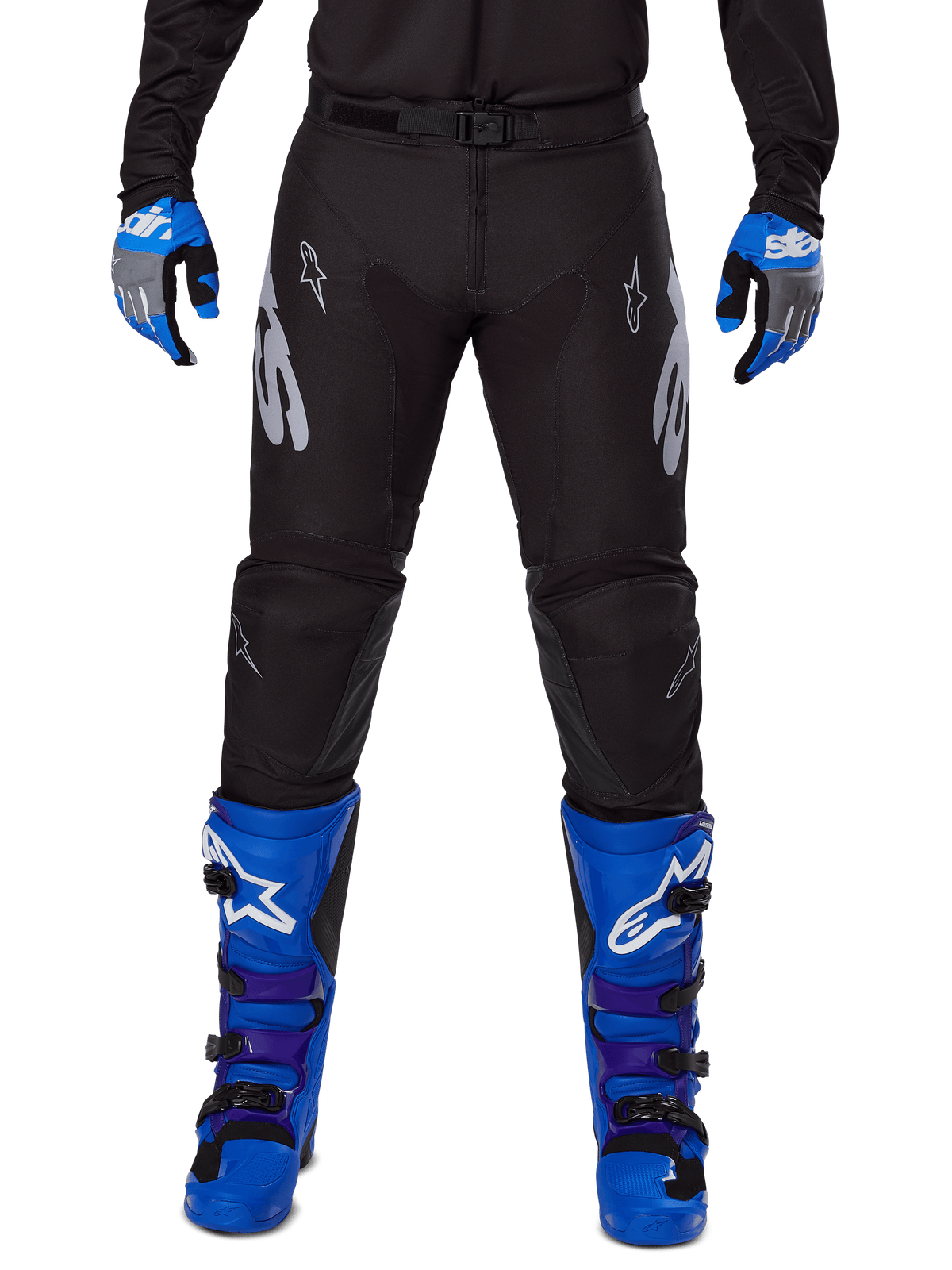 Alpinestars 2025 Racer Graphite Pants, Motocross Pants, Black and Gray, worn with blue and gray gloves and blue boots, featuring silver Astars branding on the thighs and reinforced knees, sporty design for off-road performance