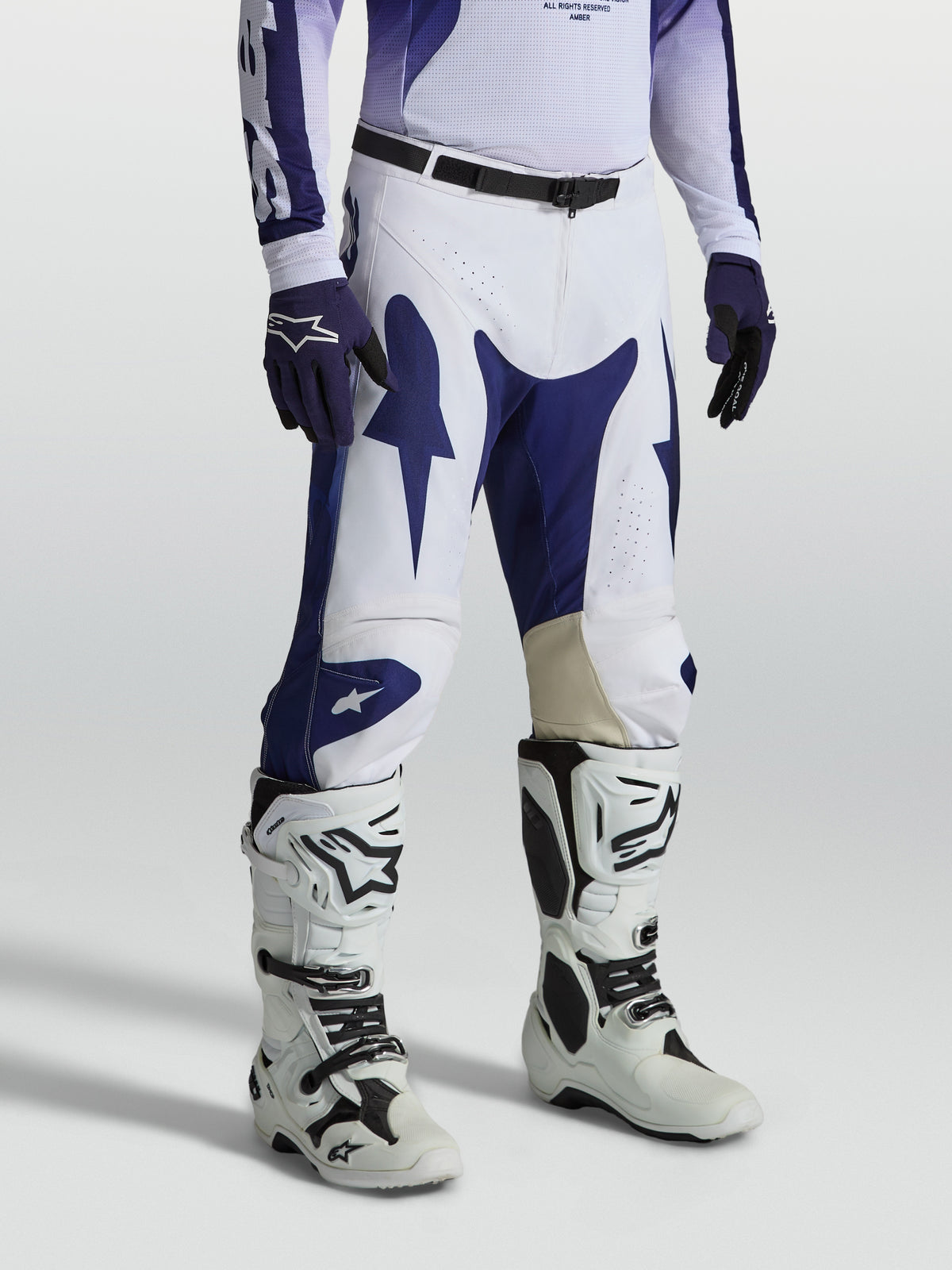Alpinestars Racer Air Amber Pants, Men's Blue and White Motocross Pants, with perforated polyfabric and pre-curved race fit.