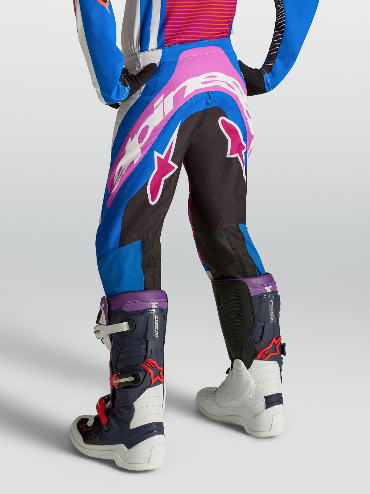 Alpinestars Youth Supertech Maven Pants, youth motocross racing pants in blue, pink, and white with a premium athletic fit.
