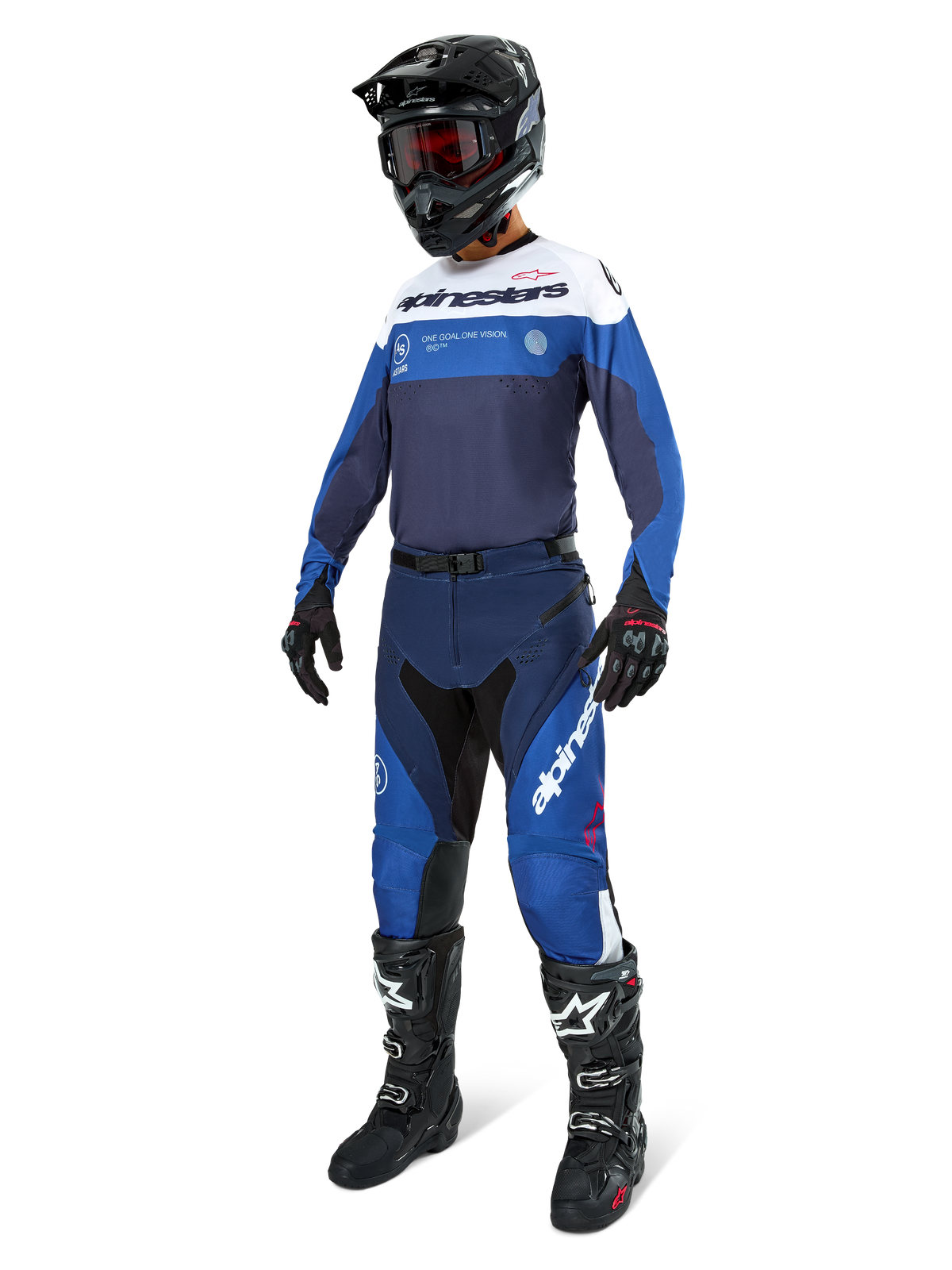 Motocross rider wearing complete racing gear, Pro-Dura Jersey in Navy Bright Blue and White, matching blue and navy pants, black helmet with red goggles, black boots with white accents, and black gloves, coordinated outfit for enduro and off-road riding