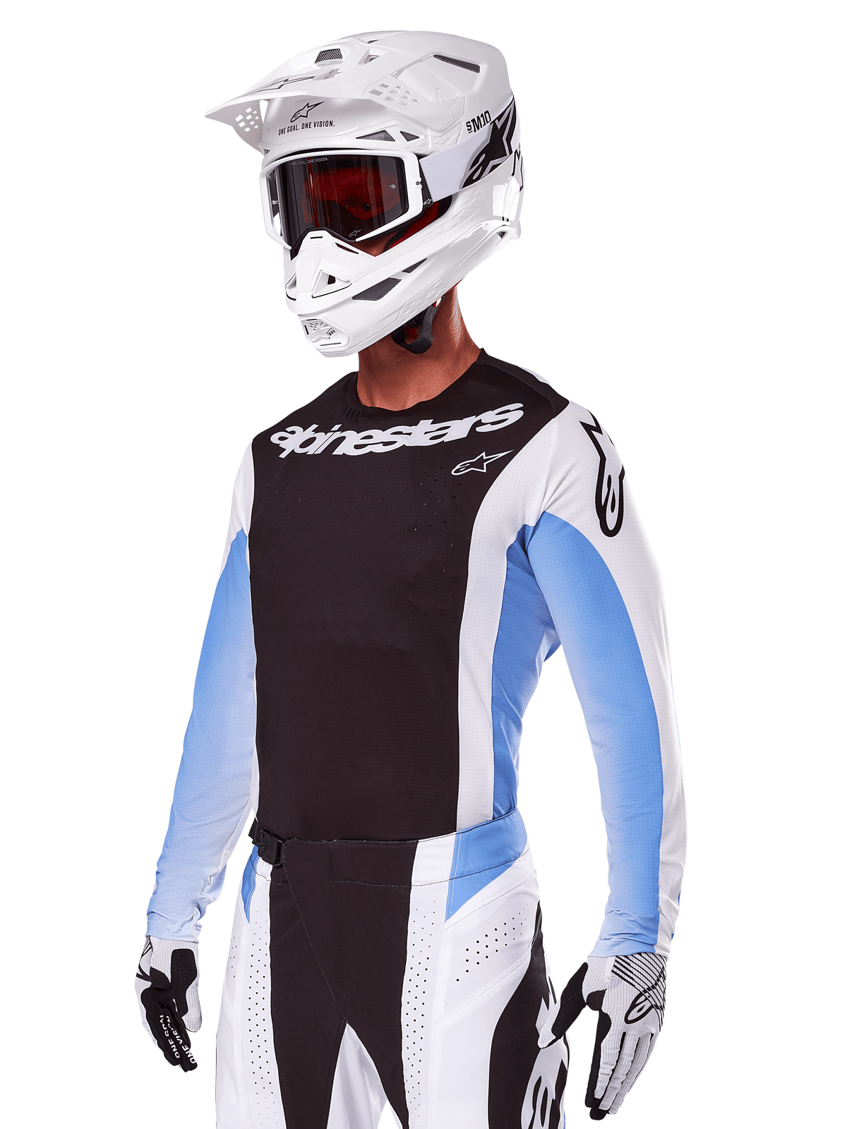 Motocross rider wearing Alpinestars 2025 Techstar Melt Gear Set, White with black and light blue accents, featuring a jersey with a black chest and white sleeves, matching white and black pants, white SM10 helmet with goggles, and black and white gloves, complete professional off-road racing outfit.