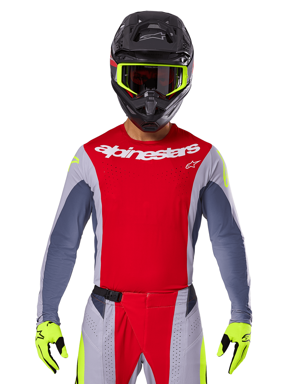 Motocross rider wearing 2025 Techstar Melt Jersey and matching pants, Bright Red and Gray with white Alpinestars branding, black helmet with neon yellow goggles, matching neon yellow gloves, ventilated performance gear for off-road racing