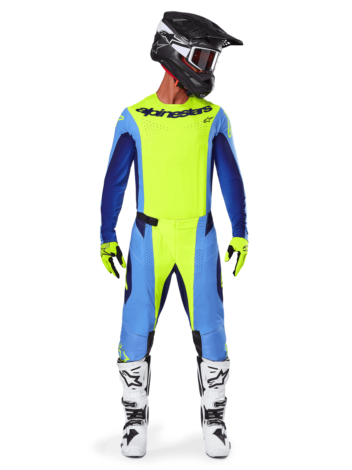 Motocross rider wearing complete racing gear, Alpinestars 2025 Techstar Melt Jersey in Yellow Fluo and Blue, matching yellow and blue motocross pants, black helmet with white graphics and goggles, white and black boots, yellow and black gloves, coordinated performance outfit for off-road racing