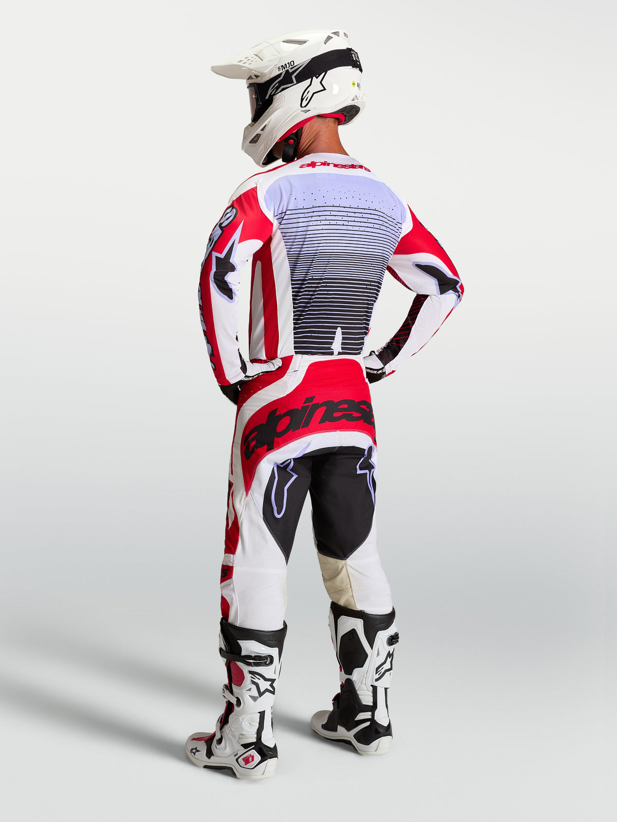 Alpinestars Techstar Maven Jersey, Men's Red and White Motocross Gear, back view with athletic fit and lavender accents.