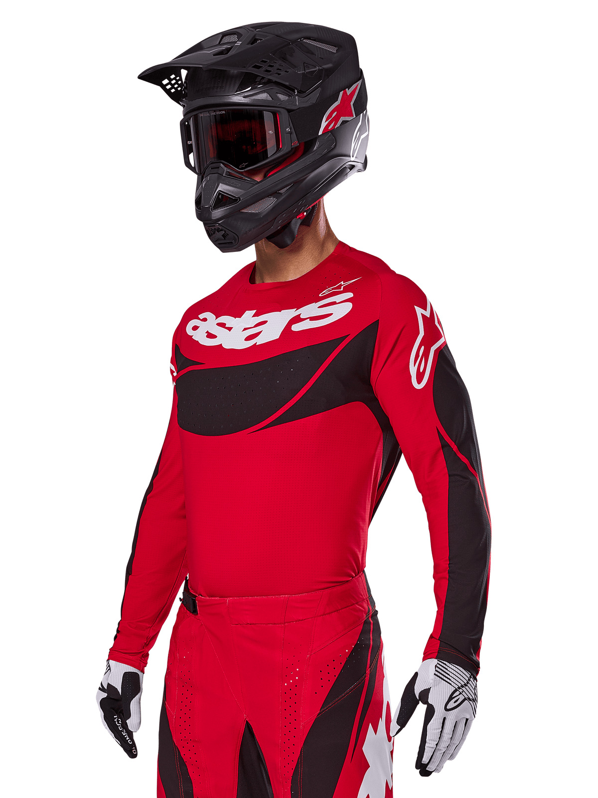 Alpinestars 2025 Techstar Dreem Gear Set, Red Motocross Jersey and Pants with black and white accents, worn with a black helmet and goggles, white and black gloves, featuring bold 'astars' branding, designed for performance off-road racing