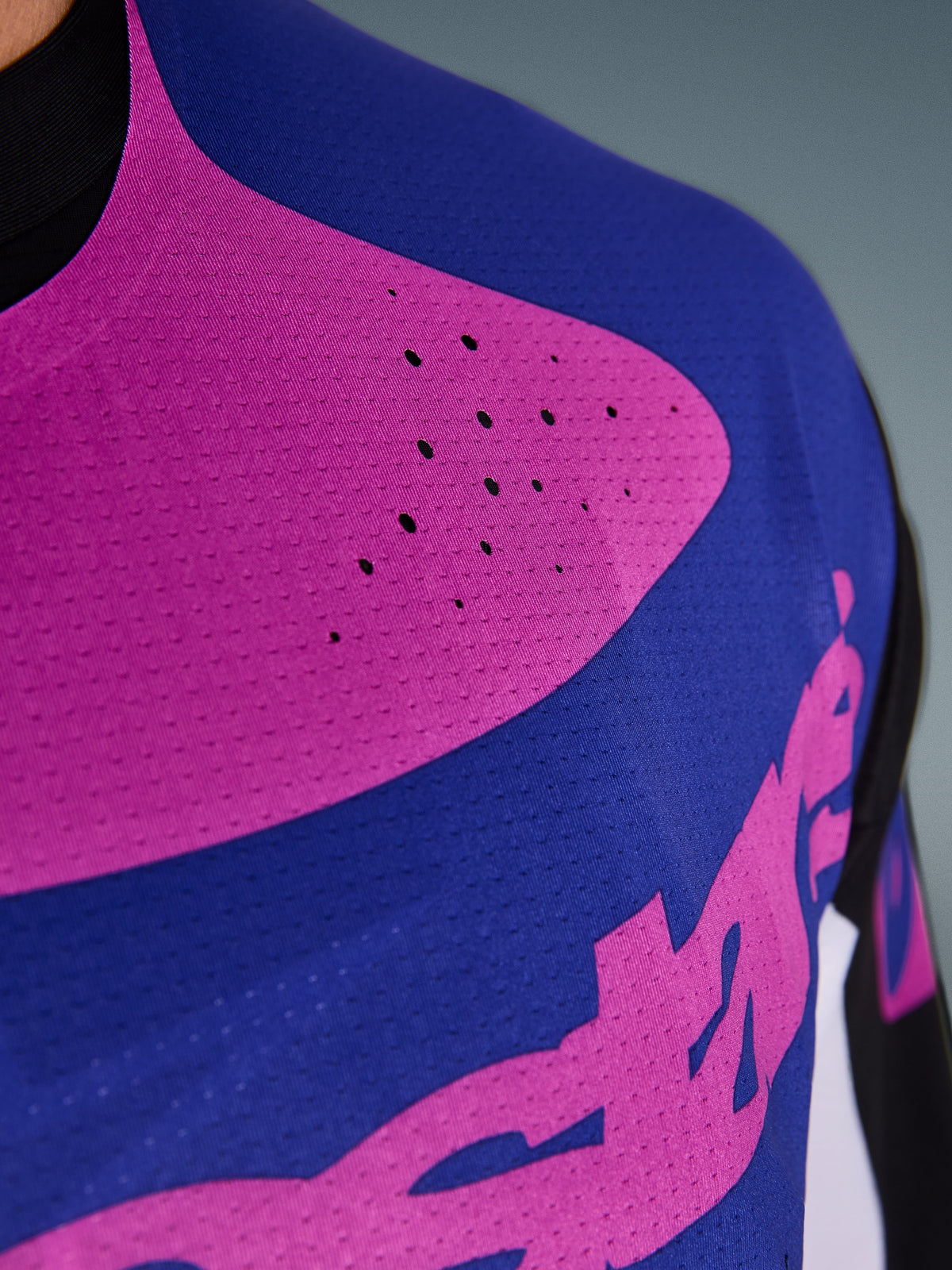 Alpinestars 2026 Techstar Knif Jersey, Motocross Jersey, Black Light Gray Purple, close-up of chest featuring laser-cut perforations and moisture-wicking stretch fabric for enhanced ventilation