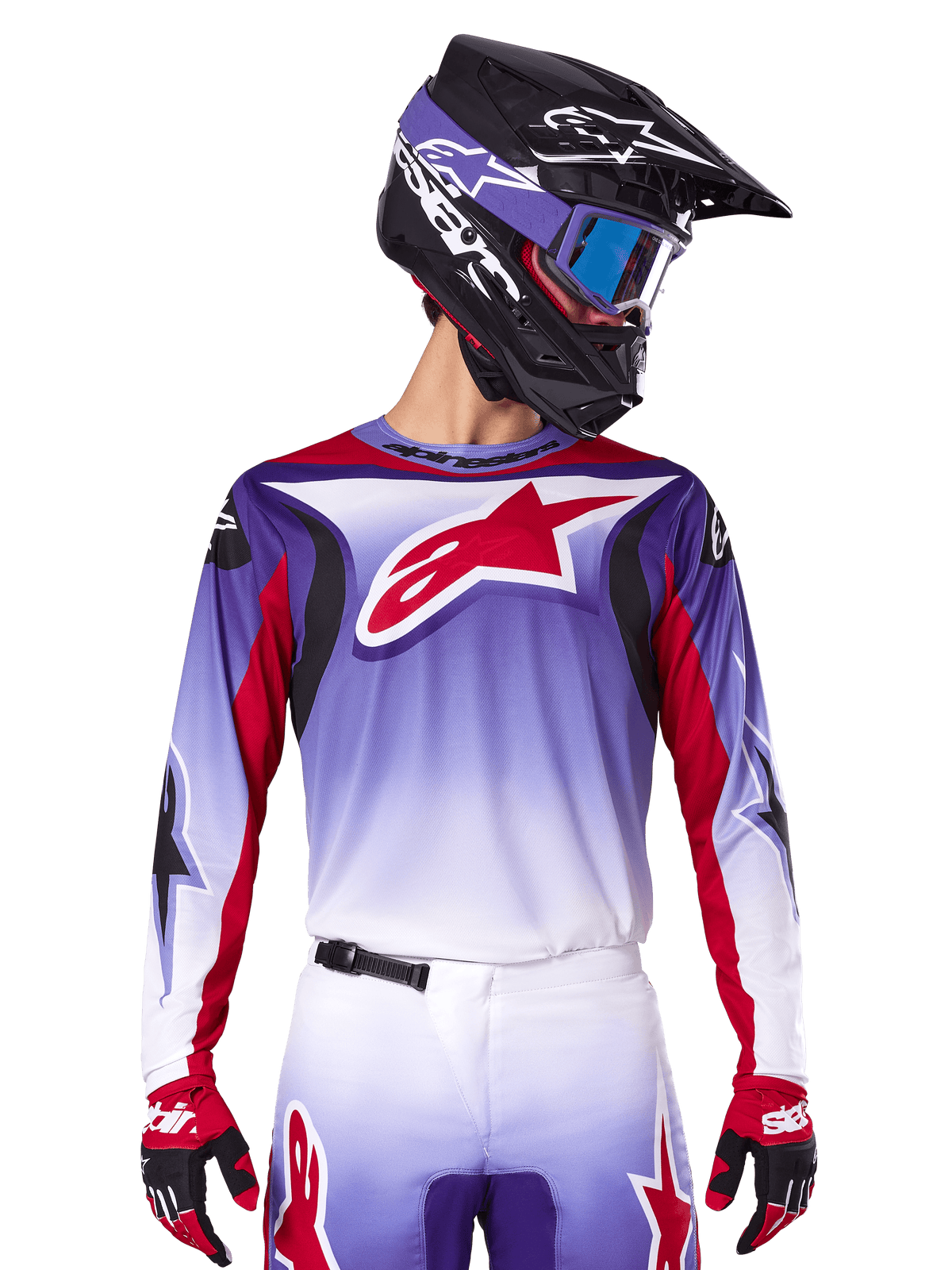 Alpinestars 2025 Fluid Wurx Jersey, Motocross Racing Jersey, Purple to White Gradient, Red star logo and accents, athletic fit, worn with matching pants, black helmet, and red gloves