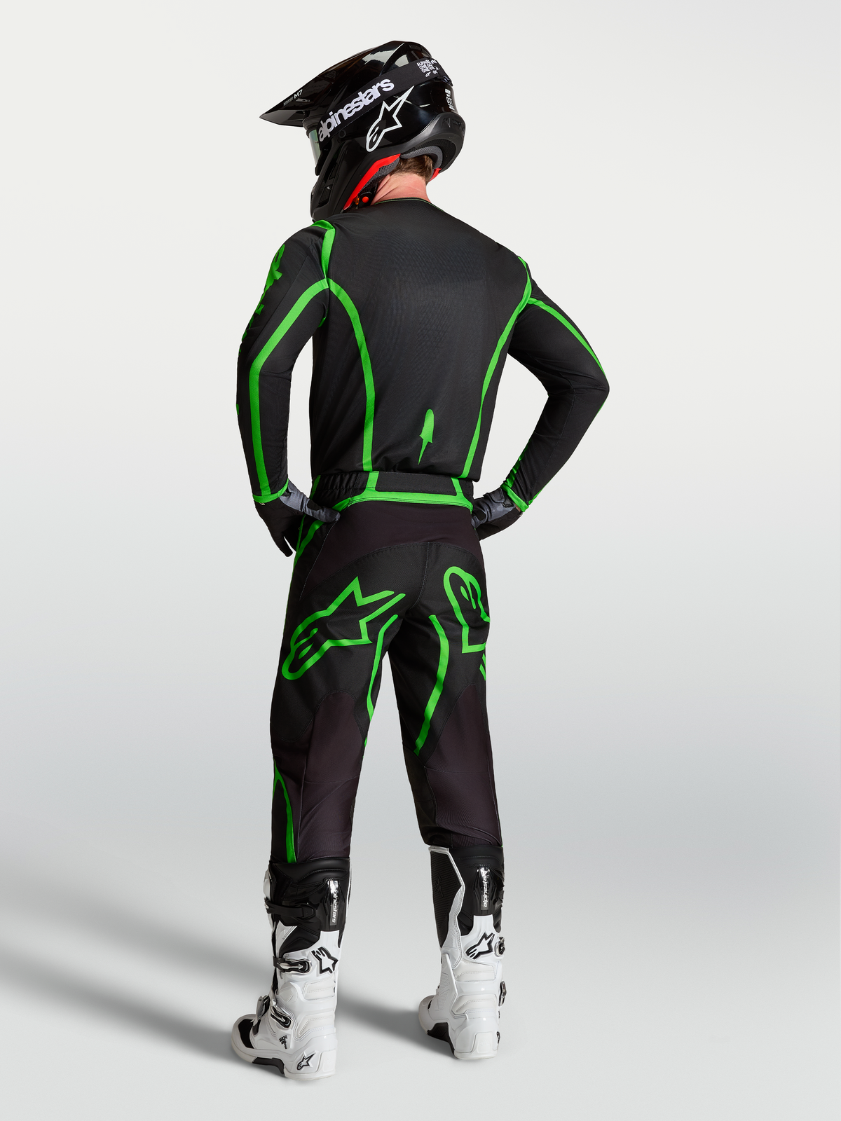 Alpinestars Fluid Apex V2 Jersey AND Gear Set, Men's Motocross Outfit, Black and Green Fluo, rear view on model.
