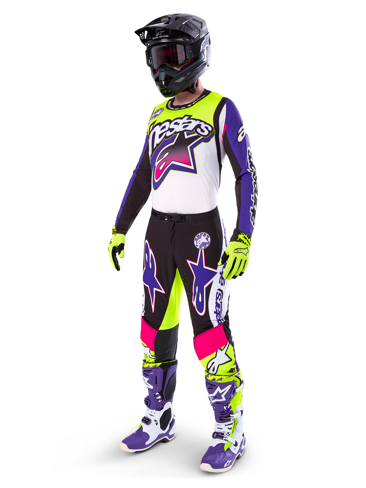 Motocross rider wearing Alpinestars Limited Edition Supertech Dirt Studios® gear, White Purple and Yellow Fluo color scheme, black pants with bold purple and pink star logos, neon yellow gloves, purple and white racing boots, black helmet, complete professional racing kit for off-road performance