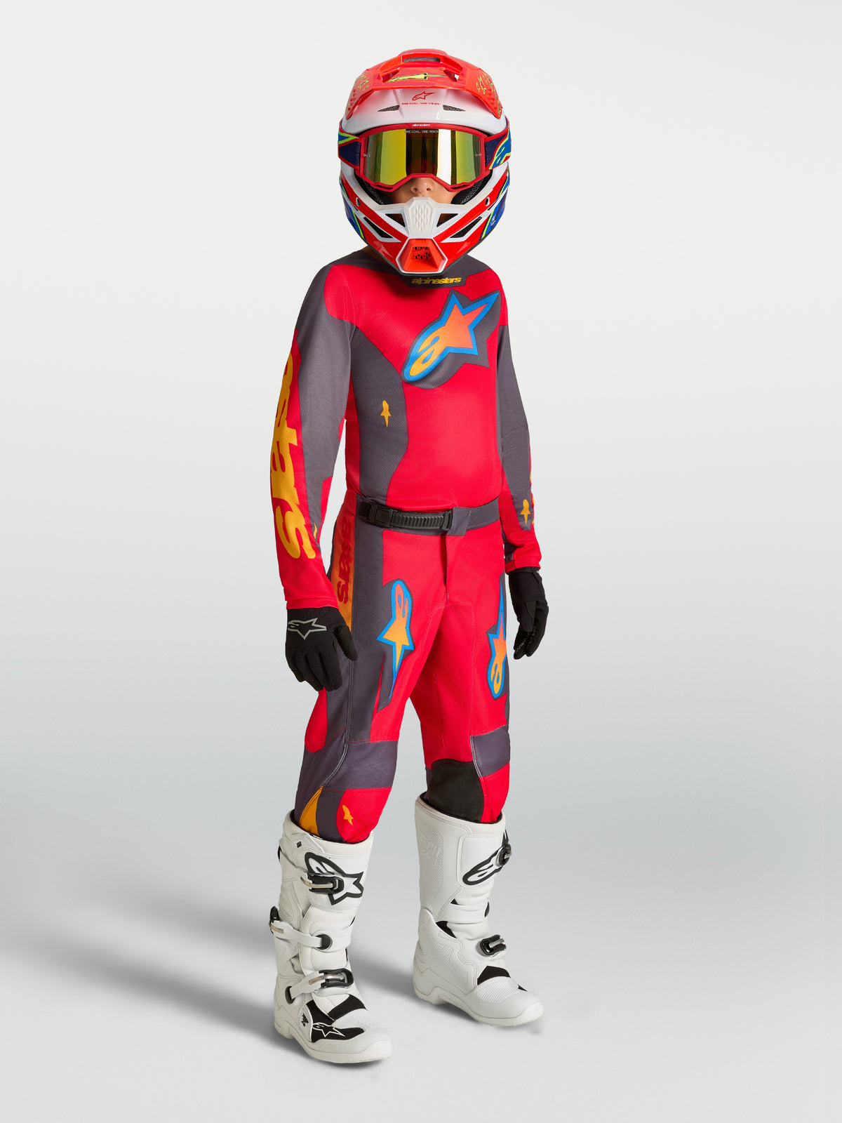 Alpinestars Youth Fluid Hunt Jersey and Gear Set, fire red and graystone youth motocross outfit with white boots.