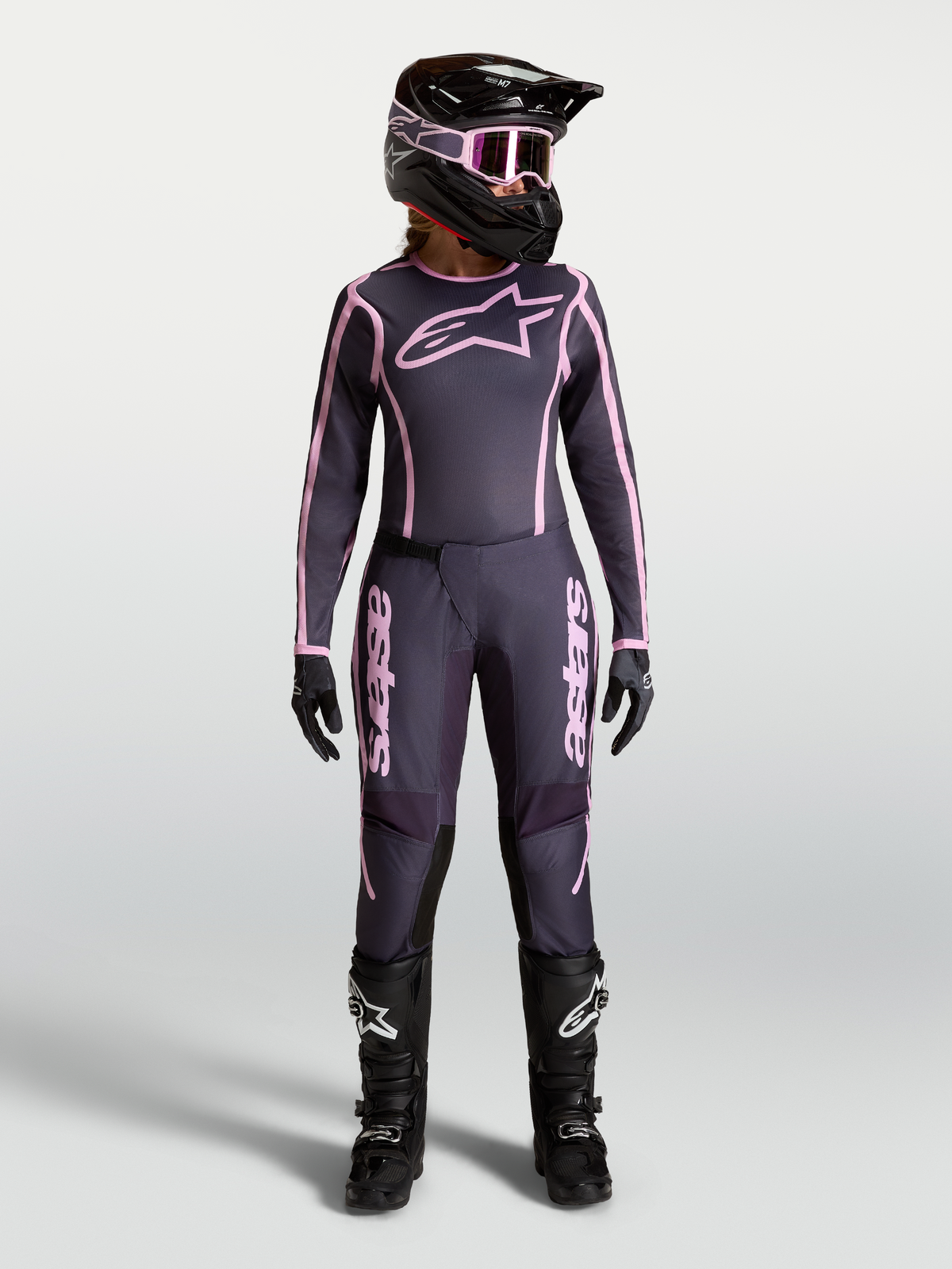 Alpinestars Stella Fluid Apex V2 Pants, Women's Motocross Gear, Graystone and Old Pink, featuring matching jersey and helmet.