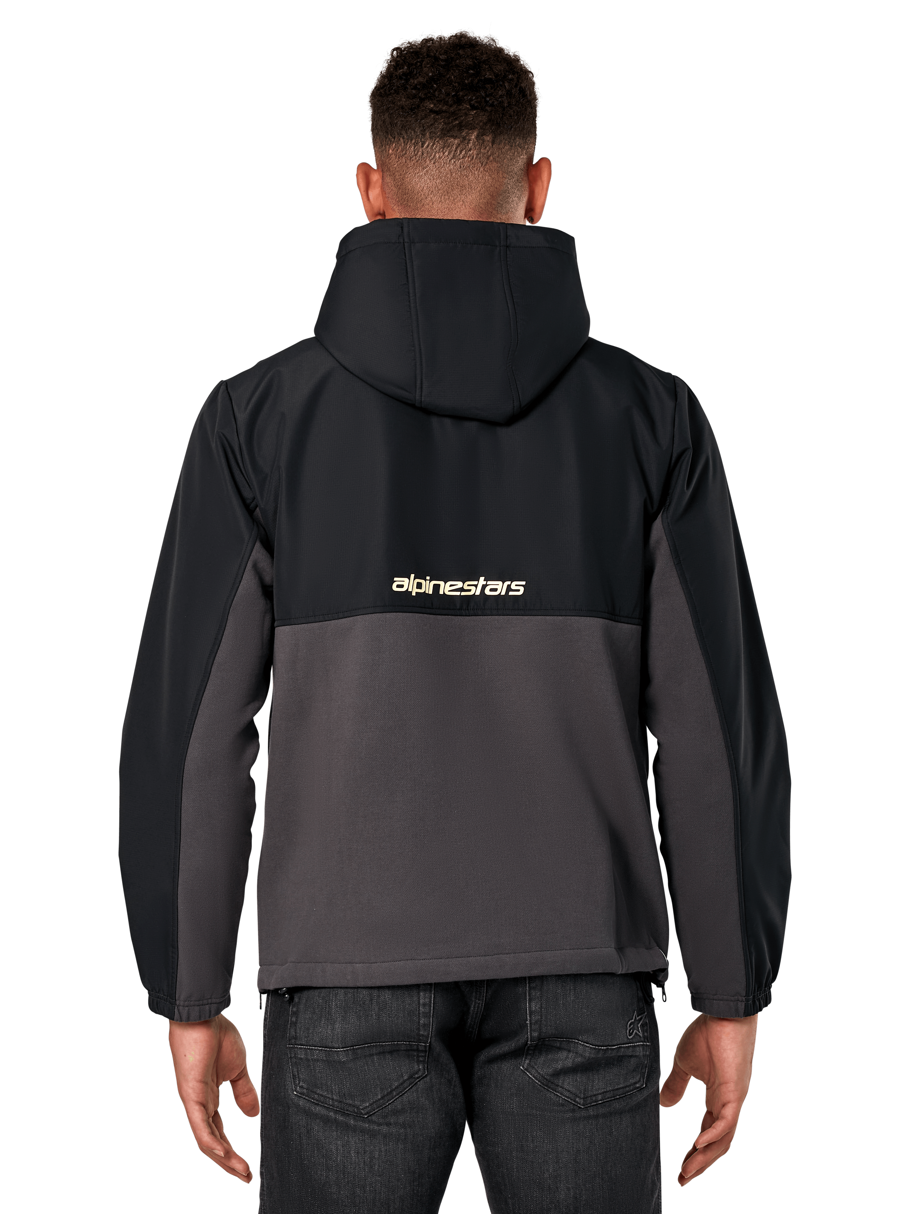 Alpinestars Juncture Hybrid Jacket, Back View, Black and Gunmetal, casual sportswear anorak with mixed material construction, ripstop upper and canvas fleece lower, Alpinestars logo on back, worn with dark pants