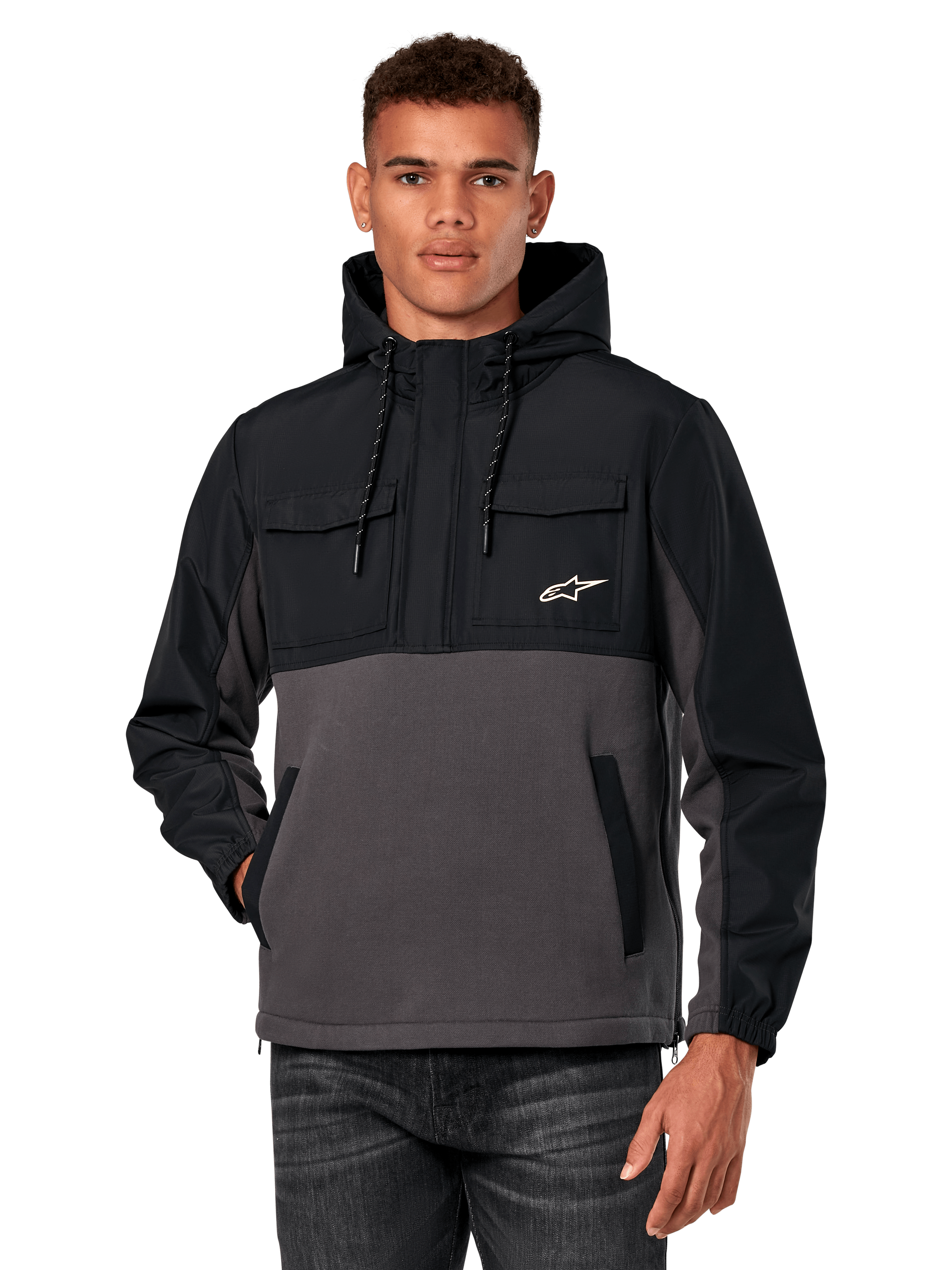 Alpinestars Juncture Hybrid Jacket, men's anorak hoodie, Black and Gunmetal Gray, two-tone design with ripstop overlays and canvas fleece, featuring chest pockets with a white star logo and drawstring hood, casual motorsport-inspired streetwear
