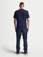 Alpinestars Ageless 2.0 CSF Tee, Men's Sportswear Short Sleeve T-Shirt, Navy Blue, rear view on-model showing the structured cut-and-sew fit and premium cotton-poly blend construction for everyday casual wear.