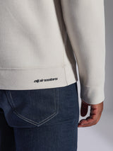 Alpinestars Positive Crew Sweatshirt, Off White, close-up detail of ribbed hem and cuff, featuring small black Alpinestars logo, casual motorsport-inspired apparel