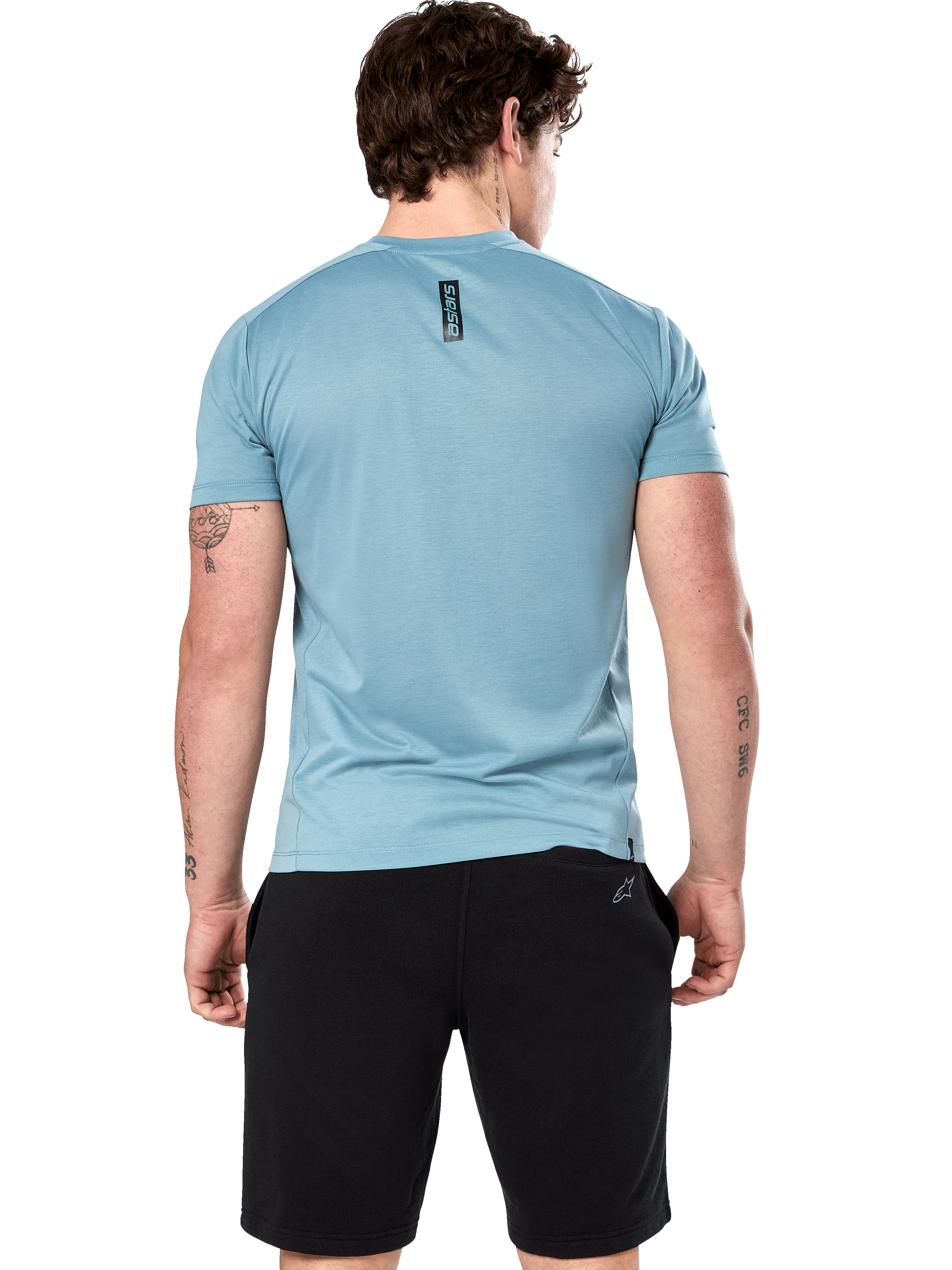 Alpinestars Point Performance Tee, Short Sleeve T-Shirt, Ice Blue, back view on model showing vertical black astars word print, paired with black shorts, casual performance sportswear