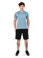 Alpinestars Point Performance Tee, Short Sleeve T-Shirt, Ice Blue, featuring a small black front logo, crew neck, worn by a model with black shorts and black sneakers, casual moisture-wicking sportswear