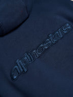 Alpinestars Emergent Oversized Hoodie, Navy Blue, close-up detail of tonal 3D embroidered Alpinestars word logo on back, premium fleece texture