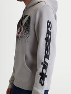 Alpinestars Obsessed Hoodie, Casual Sportswear Pullover Fleece for Riders, Cement Gray with Black Alpinestars Sleeve Graphic and MX-Inspired Chest Detail, Side View on Model, Soft Cotton and Recycled Polyester Blend