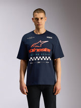 Alpinestars Aplomb Oversized CSF Tee, Short Sleeve T-Shirt, Navy Blue, Large orange and white Astars logo with checkered graphic, oversized casual motorsport-inspired streetwear