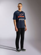 Alpinestars Aplomb Oversized CSF Tee, Short Sleeve T-Shirt, Navy, Large orange and white Astars logo with checkered graphic, casual motorsport-inspired streetwear