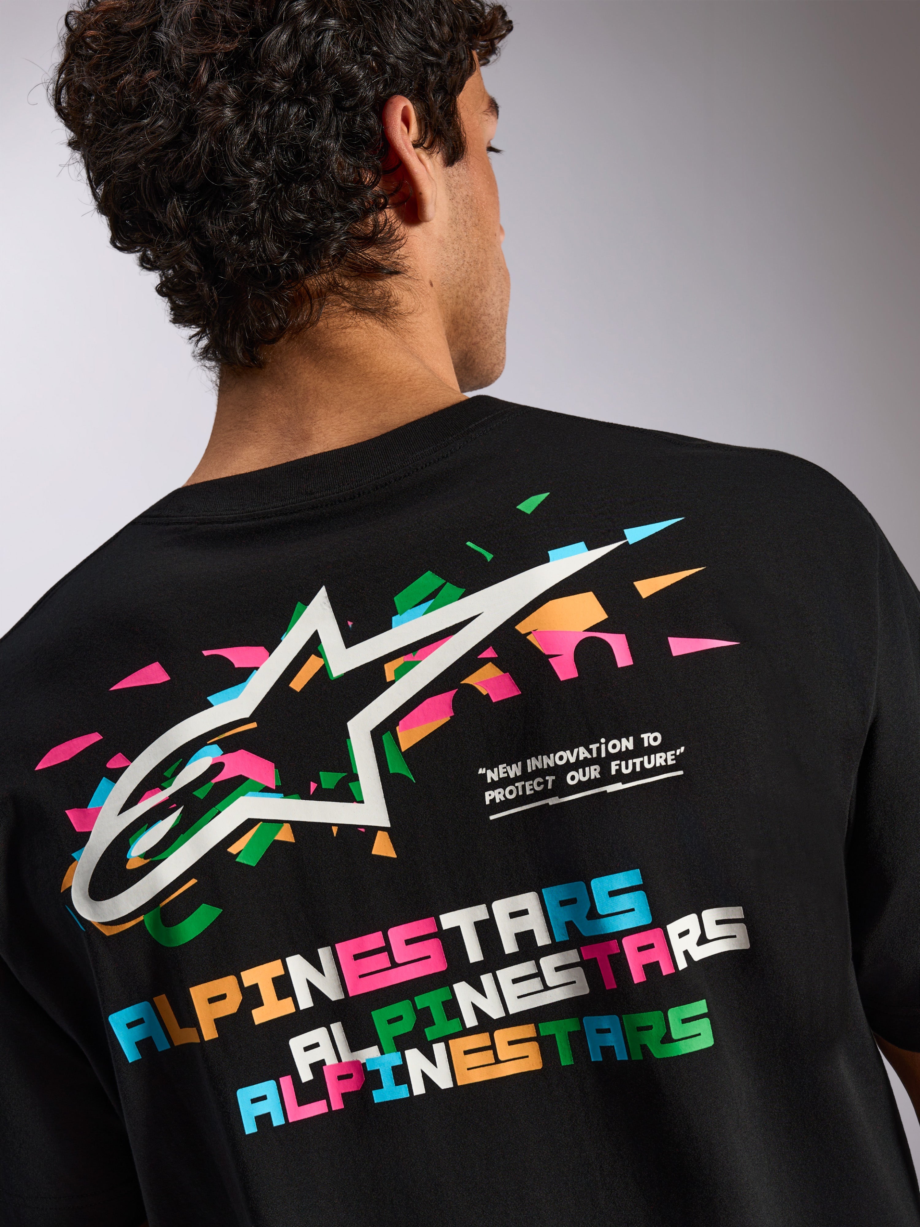 Alpinestars Wild Oversized CSF Tee, Short Sleeve T-Shirt, Black, Large back graphic with vibrant multi-colored Astars logo and typography, Casual Sportswear