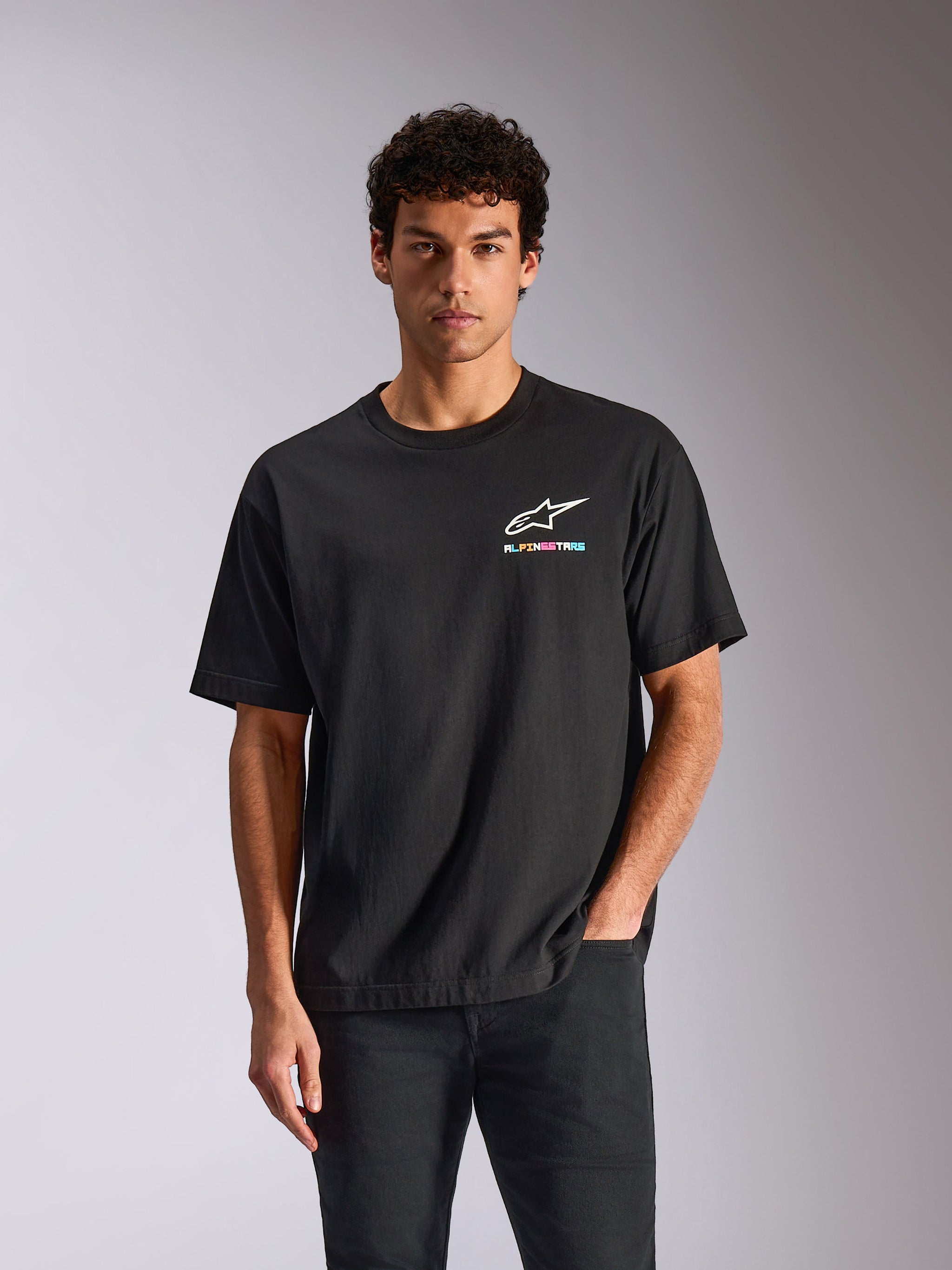 Alpinestars Wild Oversized CSF Tee, Short Sleeve T-Shirt, Black, White Astars Logo with Vibrant Multi-Color Text, Casual Motorsport Streetwear