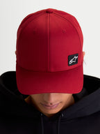 Alpinestars Pivot Hat, Casual Sportswear Baseball Cap, Dark Red, Unisex, featuring a curved bill, structured crown, and a small black Astars logo embroidered patch on durable twill fabric, on-model view.