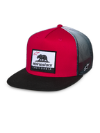 Alpinestars Cali Gradient Trucker Hat, Red Black and White, structured red crown with black flat bill, grey gradient mesh back, featuring a Cali Bear woven patch and side logo embroidery, casual motorsport headwear