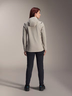 Alpinestars Woman Stella A-Dura Thermal Jacket, Titanium Gray, back view worn with black pants, featuring a fleece-lined insulated hood and a small red logo, functional and stylish mountain bike jacket for cold-weather riding.