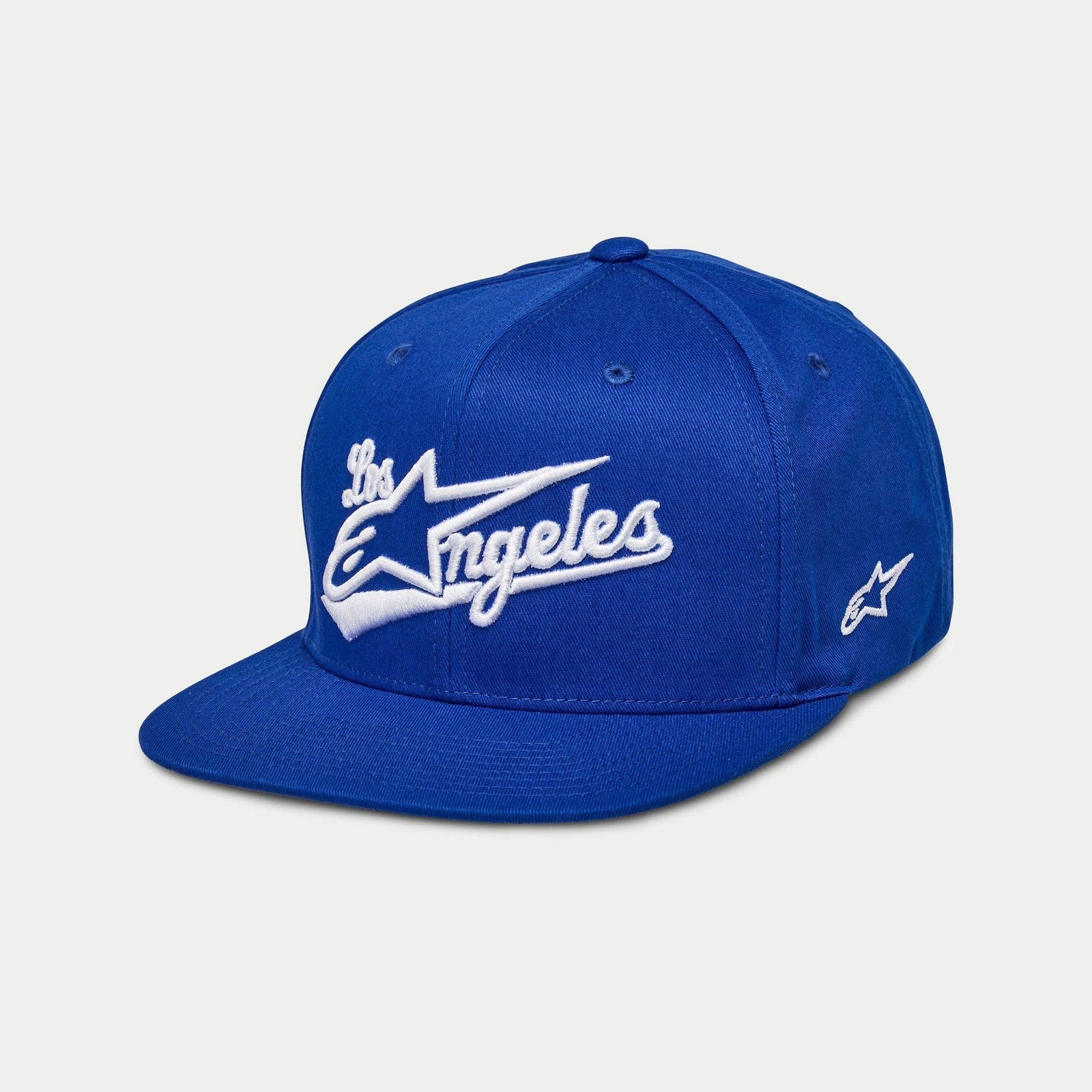 Alpinestars Los Angeles Hat, flat bill snapback cap, Blue with White 3D 'Los Angeles' athletic font embroidery, side Ageless logo, structured crown, casual motorsport-inspired headwear